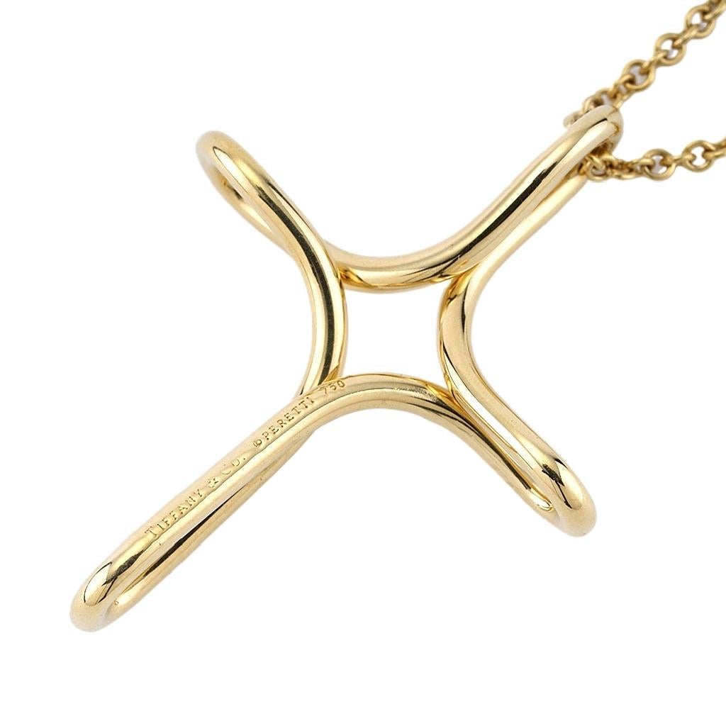 Tiffany & Co. Elsa Peretti Infinity Cross Pendant Necklace in 18k Yellow Gold In Excellent Condition In San Diego, CA