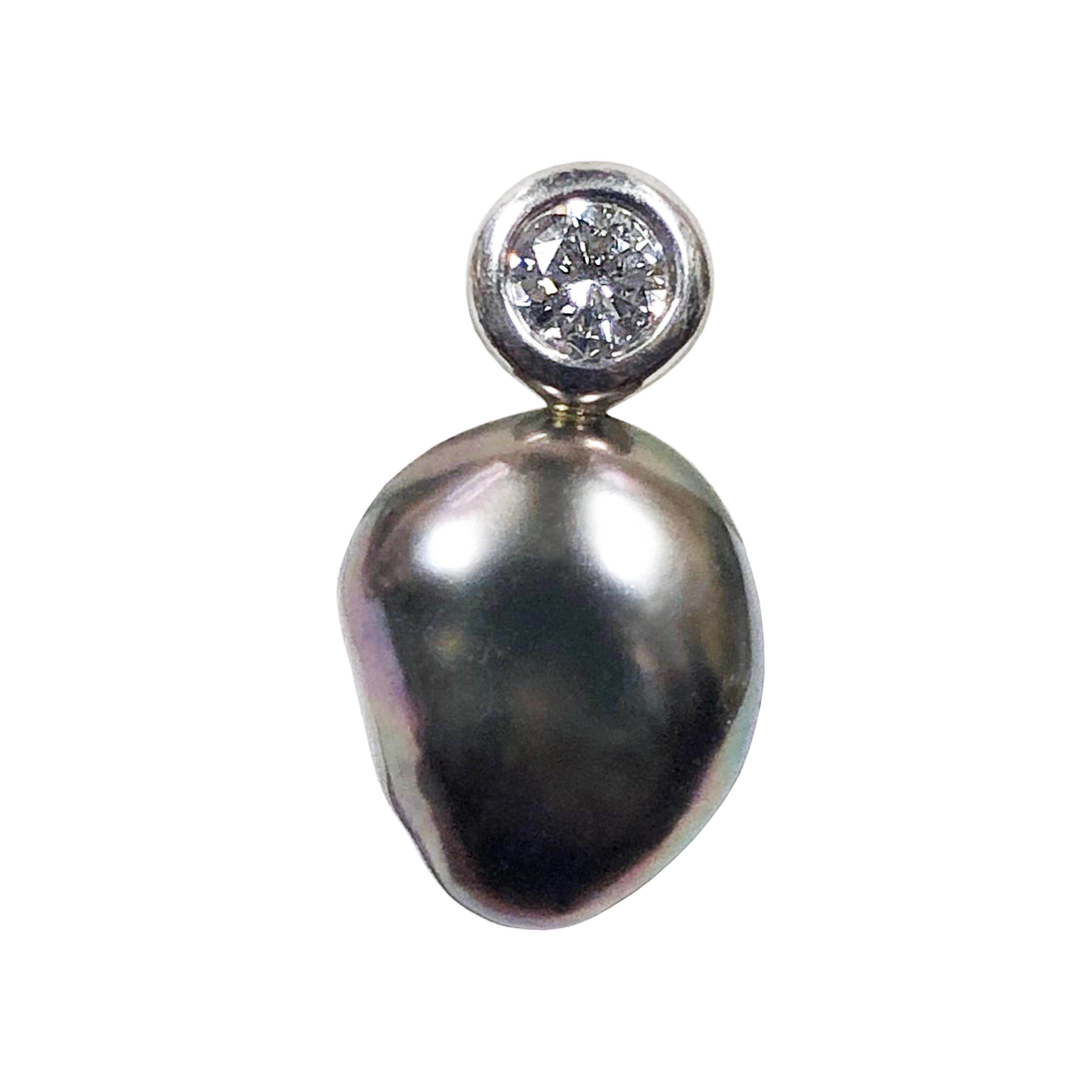 Circa 2017 Elsa Peretti for Tiffany & Company Platinum Earrings, set with Round Brilliant cut Diamonds totaling .28 Carat. and further set with Tahitian, Keshi Pearls measuring 10 X 8 MM. Post backs and come in the original Tiffany Presentation box.