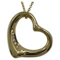 Tiffany & Co. Collana con ciondolo in oro 18k con diamante a cuore aperto grande di Elsa Peretti