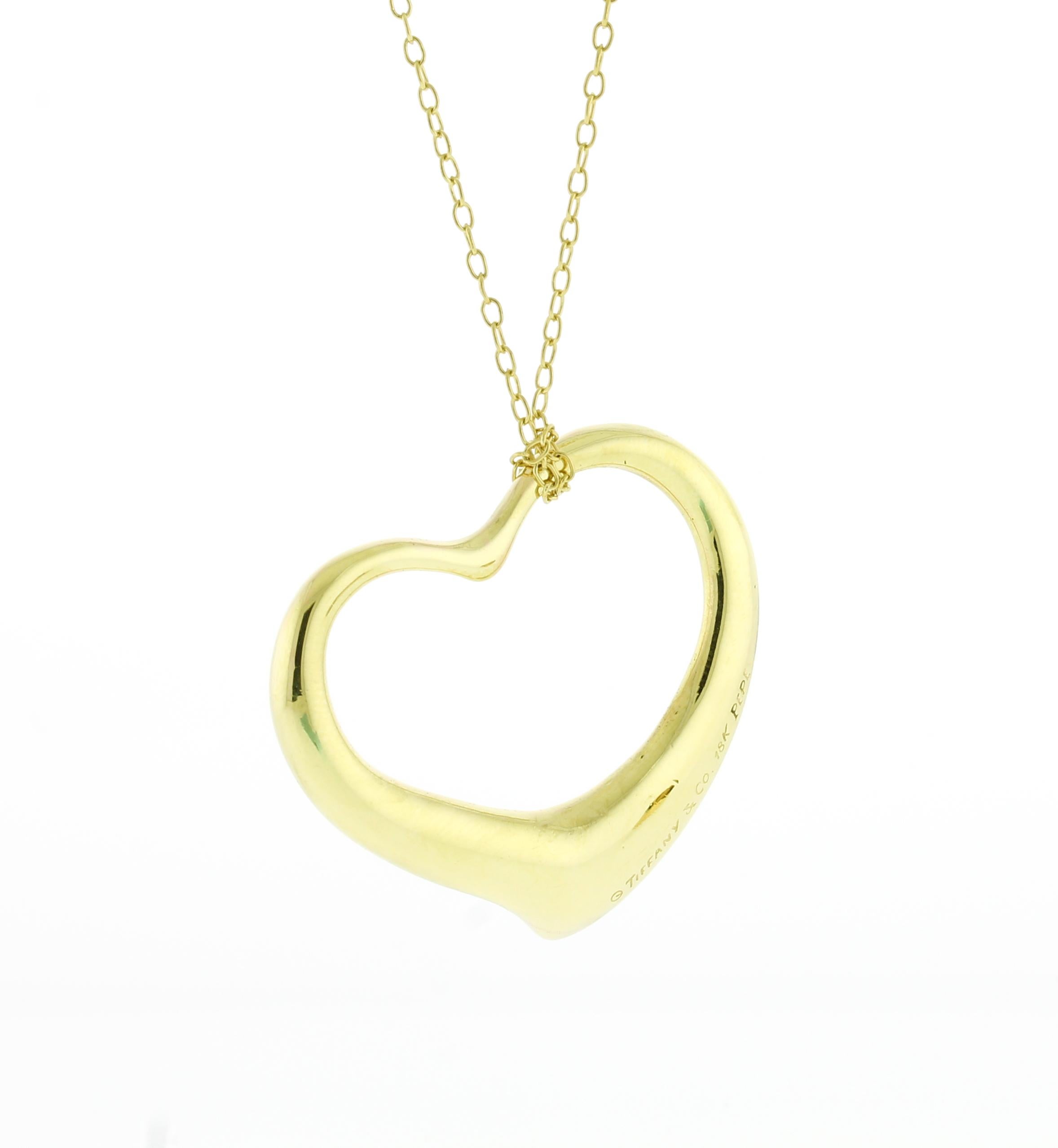 Elsa Peretti’s most celebrated icon, the open heart.  This is the large 18kt gold open heart on a 32″ chain. Original designs copyrighted by Elsa Peretti.
• Metal:18 Karat Yellow Gold
• Circa: 1990s
• Weight: 14.2 grams
• Dimensions: 1 3/8 x 1 3/8