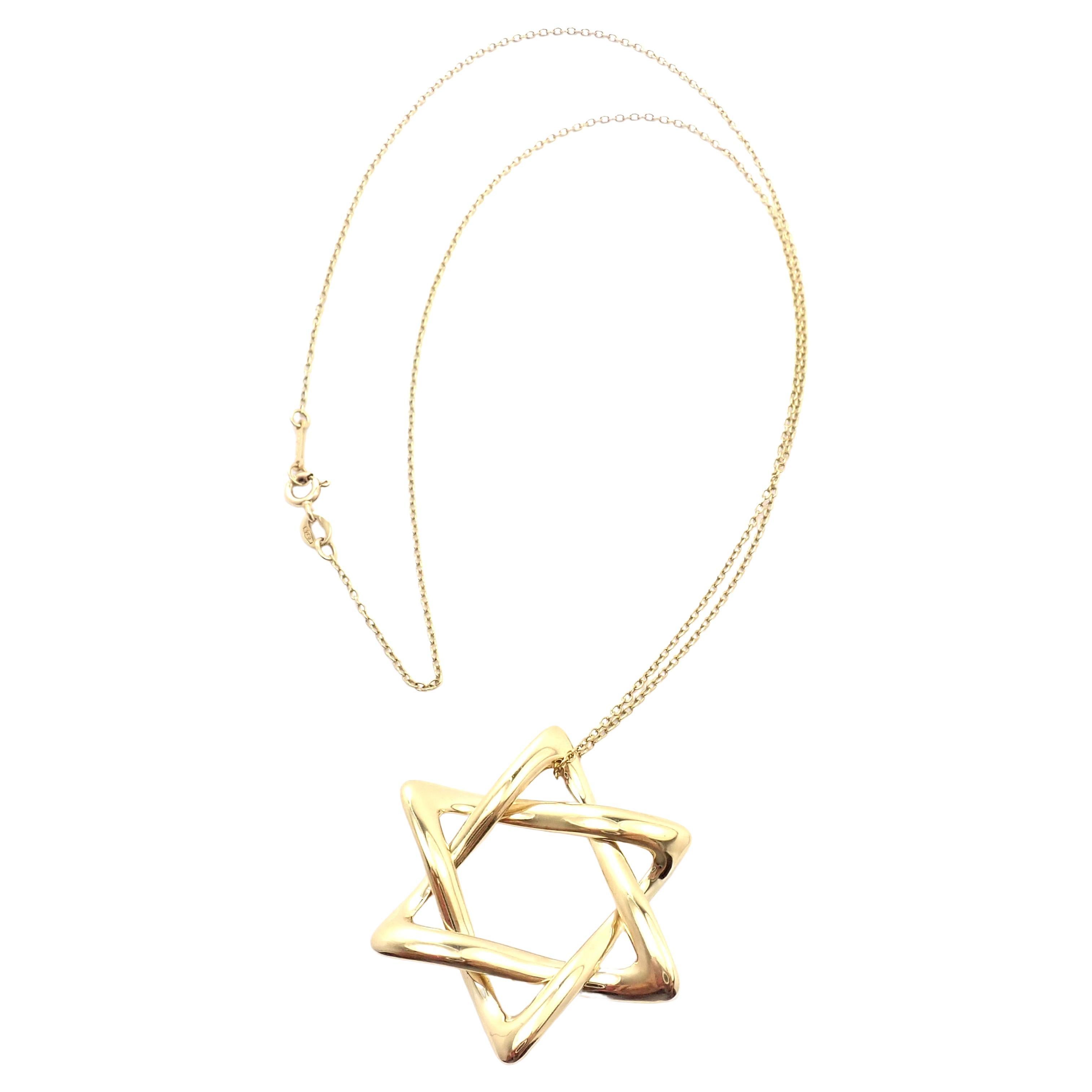 Elsa Peretti™ Star of David pendant in 18k gold, 12 mm wide. | Tiffany & Co.