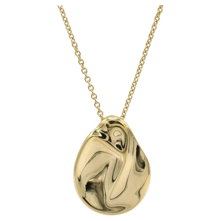 Tiffany and Co. Elsa Peretti Madonna 18 Karat Yellow Gold Drop Pendant  Necklace For Sale at 1stDibs | tiffany madonna pendant, elsa peretti  madonna pendant, mother and child necklace tiffany