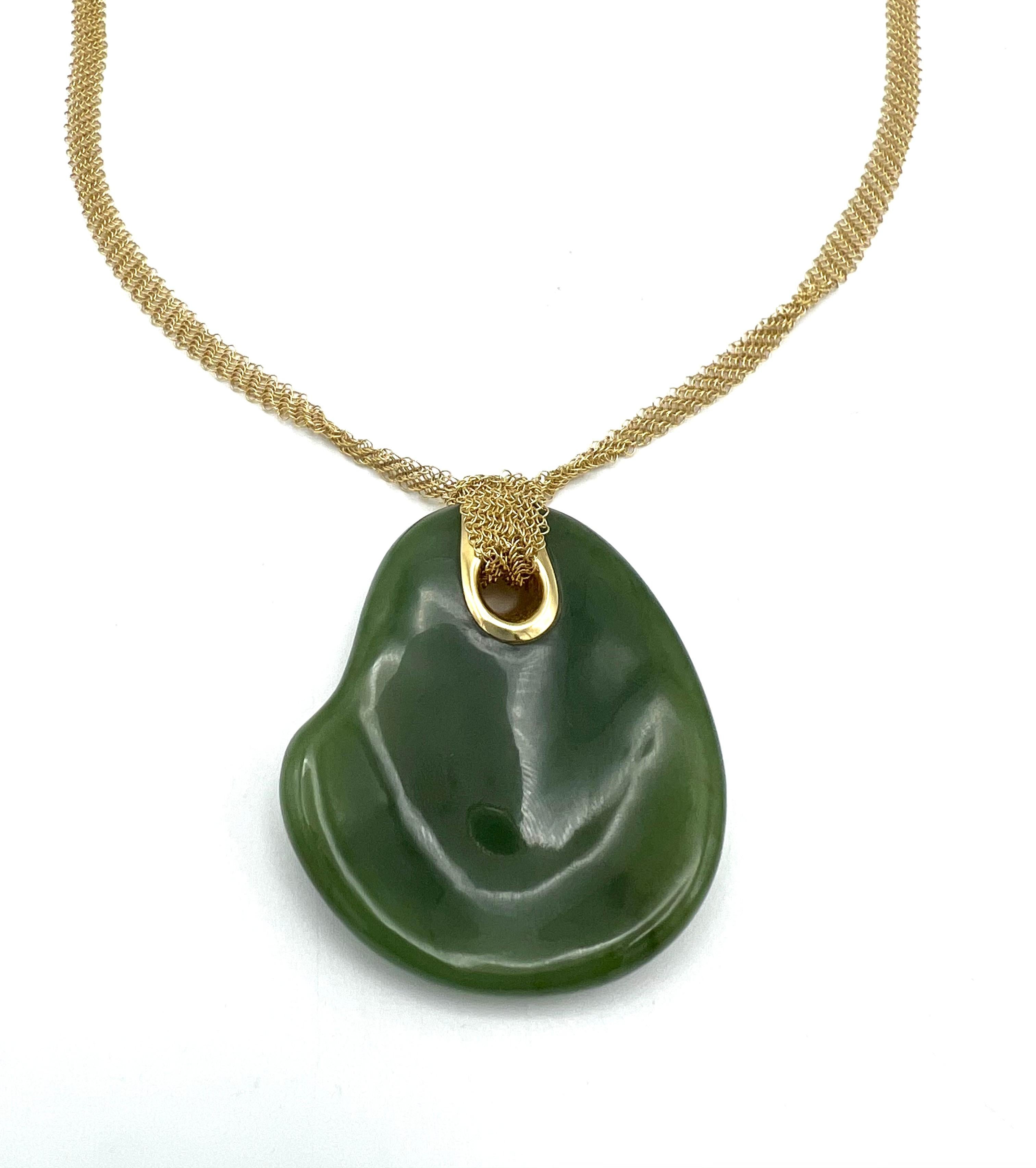 Tiffany & Co. Elsa Peretti Mesh Necklace & Green Jade Pendant
 
​
​This Tiffany & Co. Elsa Peretti Mesh necklace with a green jade pendant is a rare find.
​The Touchstone pendant is designed as a nephrite jade plaque. Once you see it, you want to