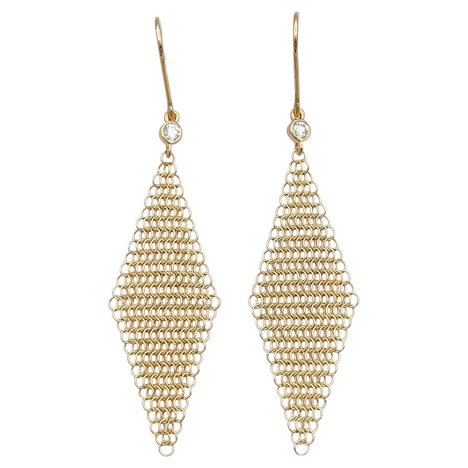 Elsa Peretti's exquisite design for Tiffany & Co. has manifested itself in a captivating pair of rose gold earrings that seamlessly blend sophistication and modernity. The delicate mesh diamond shape of the earrings exudes a sense of intricate