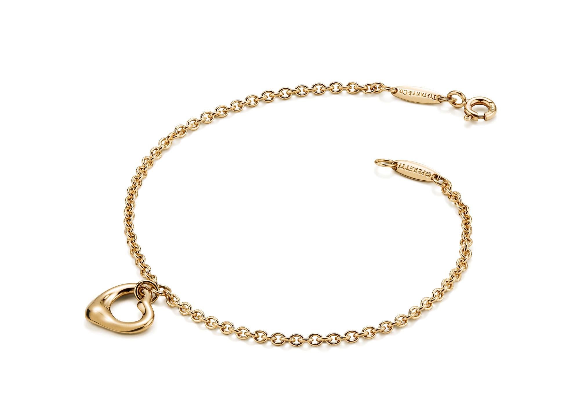Tiffany & Co Elsa Peretti for Tiffany & Co Open Heart Bracelet 11mm 18K Yellow Gold     



Véritable Tiffany & Co. Bracelet

Poinçonné TIFFANY & CO. PERETTI Au750 

Design/One

Sur une chaîne Tiffany de 2 mm

Elegance simple

Consultez nos annonces