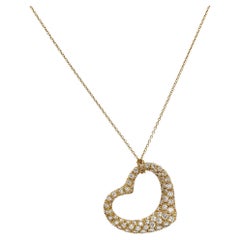 Tiffany & Co. Elsa Peretti Halskette aus 18 Karat Gelbgold mit offenem Herz und Diamanten