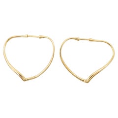 Tiffany & Co. Orecchini a cerchio medi a cuore aperto di Elsa Peretti in oro giallo 18k