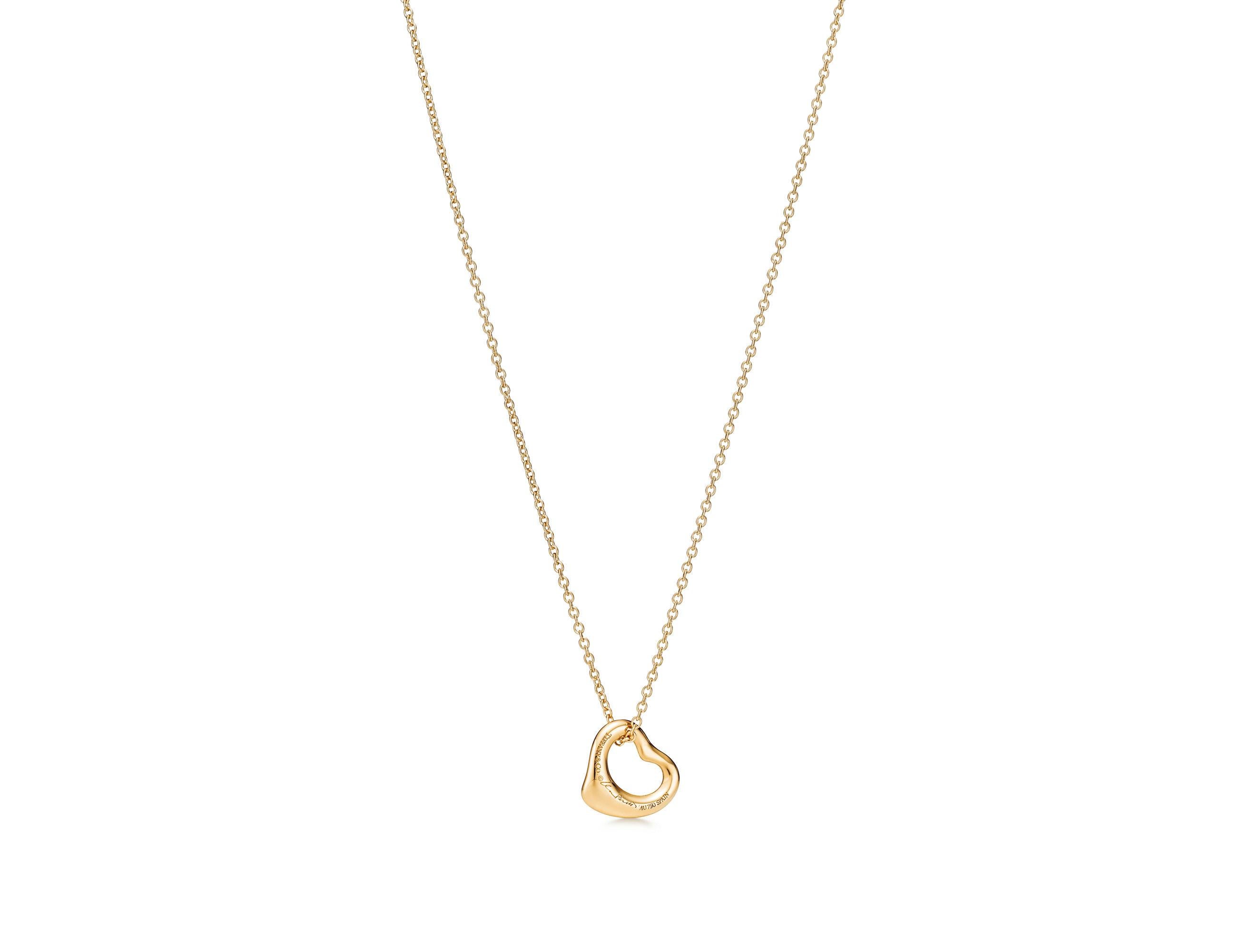 Tiffany & Co Elsa Peretti for for Tiffany & Co Open Heart Pendentif 11mm 18K Yellow Gold
     

Véritable Tiffany & Co. Pendentif

Poinçonné TIFFANY & CO. PERETTI Au750 

Design/One

Sur chaîne Tiffany

Elegance simple

Consultez nos annonces pour