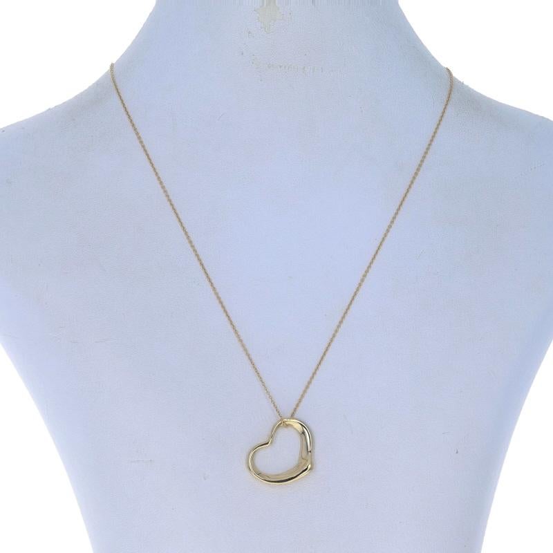 Retail Price: $2,250

Brand: Tiffany & Co.
Designer: Elsa Peretti
Collection: Open Heart

Metal Content: 18k Yellow Gold

Chain Style: Cable
Necklace Style: Chain
Fastening Type: Spring Ring Clasp
Theme: Love

Measurements

Item 1: Pendant
Tall: