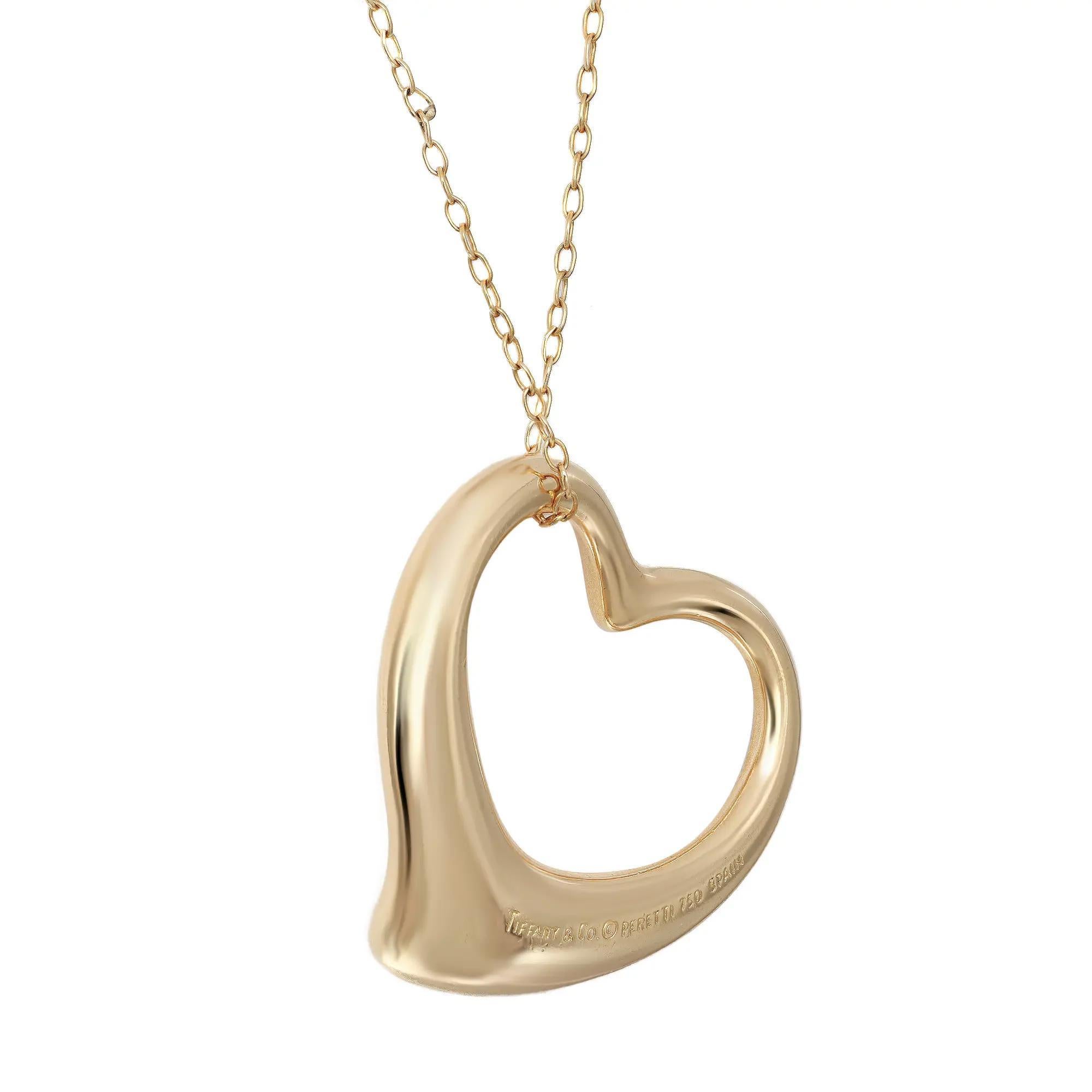 This is Tiffany's simple, evocative shape of Elsa Peretti Open Heart. This design celebrates the spirit of love and accentuate the elegant curves of this heart shape pendant. Crafted in 18k yellow gold. Chain Length: 32.5 inches. Pendant width: