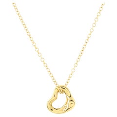 Tiffany & Co. Elsa Peretti Collier pendentif en forme de cœur ouvert en or jaune 18 carats, 7 mm