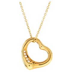 Tiffany & Co. Elsa Peretti Collier pendentif en forme de cœur ouvert en or jaune 18 carats 