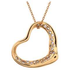 Tiffany & Co. Elsa Peretti Collier pendentif en forme de cœur ouvert en or jaune 18 carats