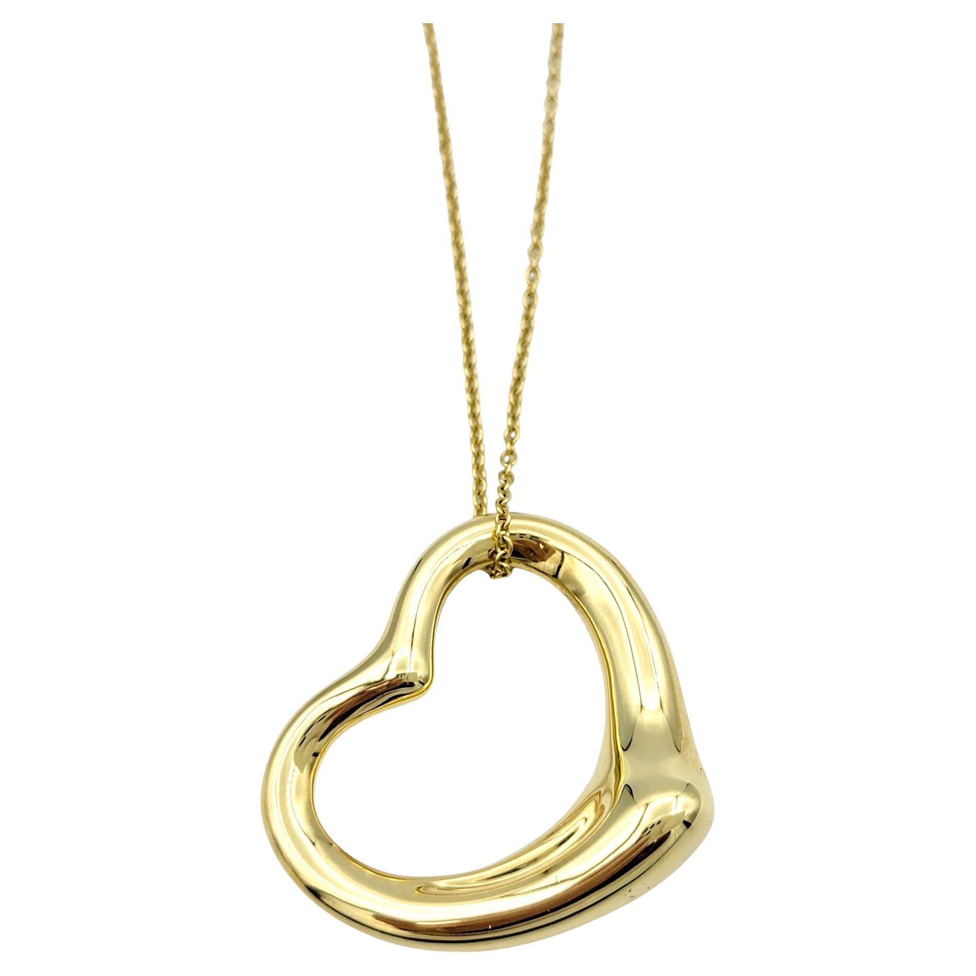 Tiffany & Co. Elsa Peretti Open Heart Pendant Necklace in 18 Karat Yellow Gold For Sale