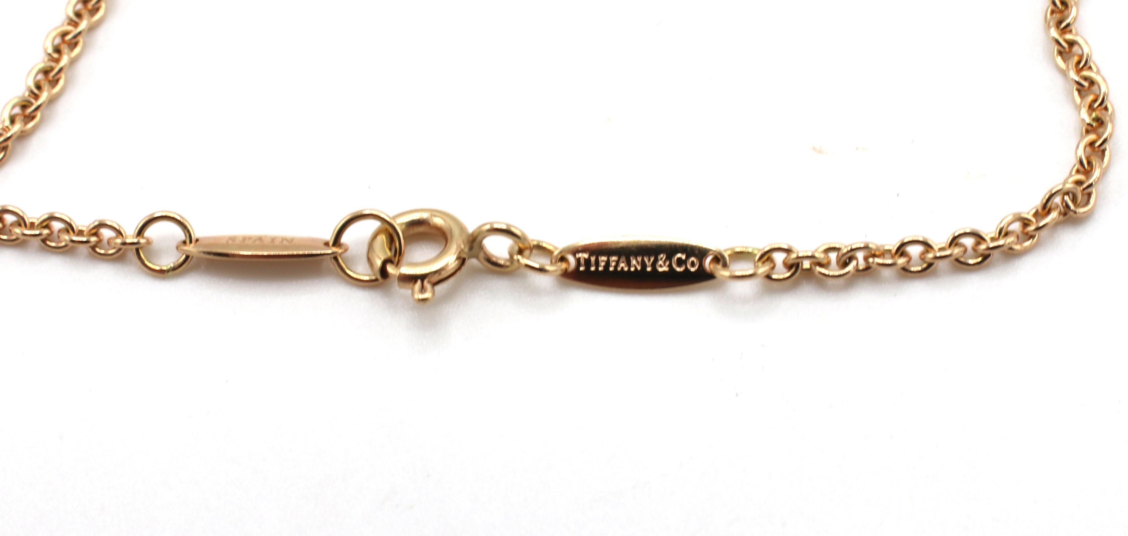 Tiffany & Co Elsa Peretti Open Heart Rose Gold Bracelet 
Metal: 18k rose gold
Weight: 3.56 grams
Heart: 11mm
Length: 7.25 inch
Retail: $825 (USD)
Signed: Tiffany & Co. Au750 PERETTI SPAIN