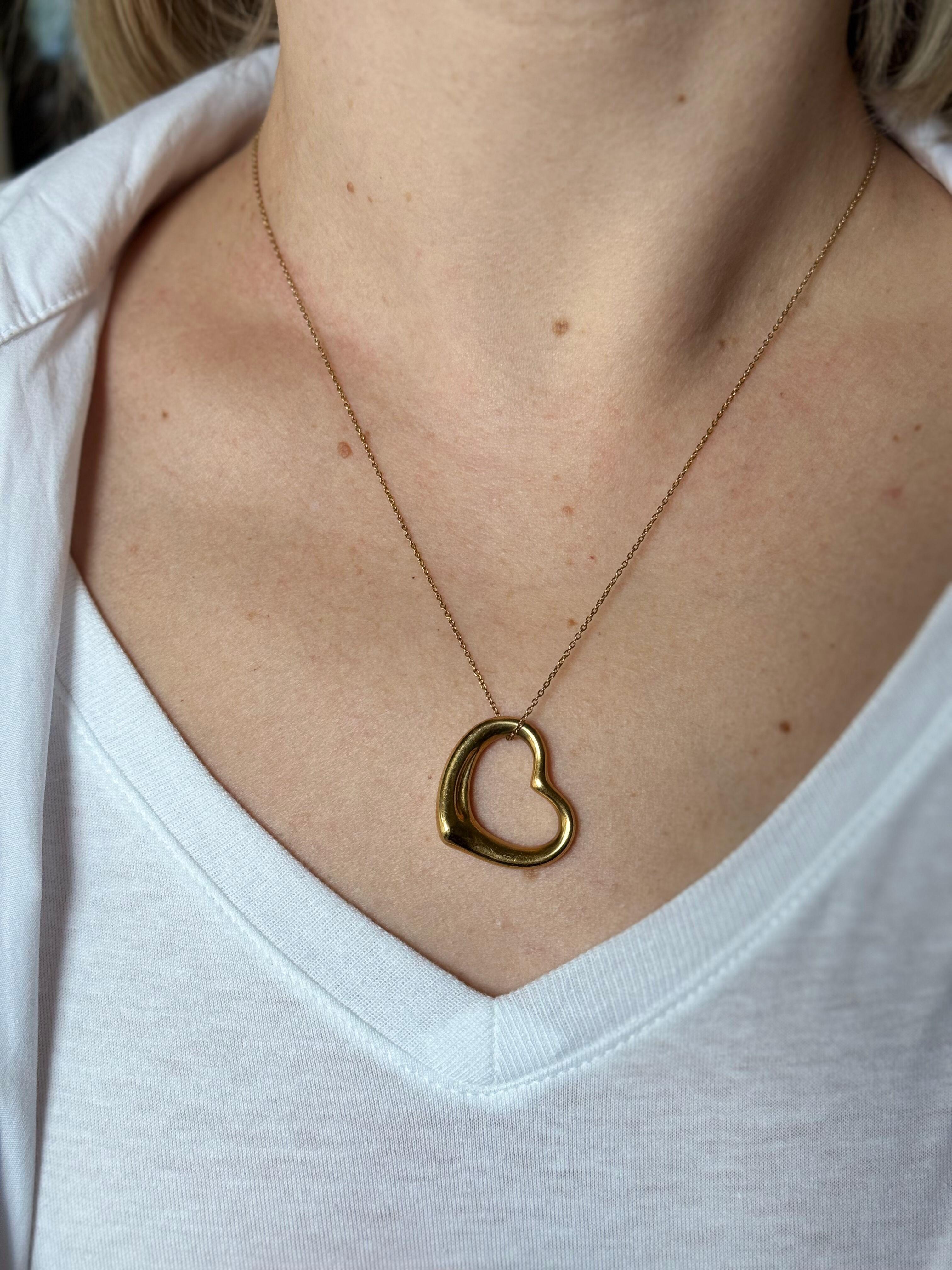 18k yellow gold necklace by Elsa Peretti for Tiffany & Co, from Open heart collection. Necklace is 19.5