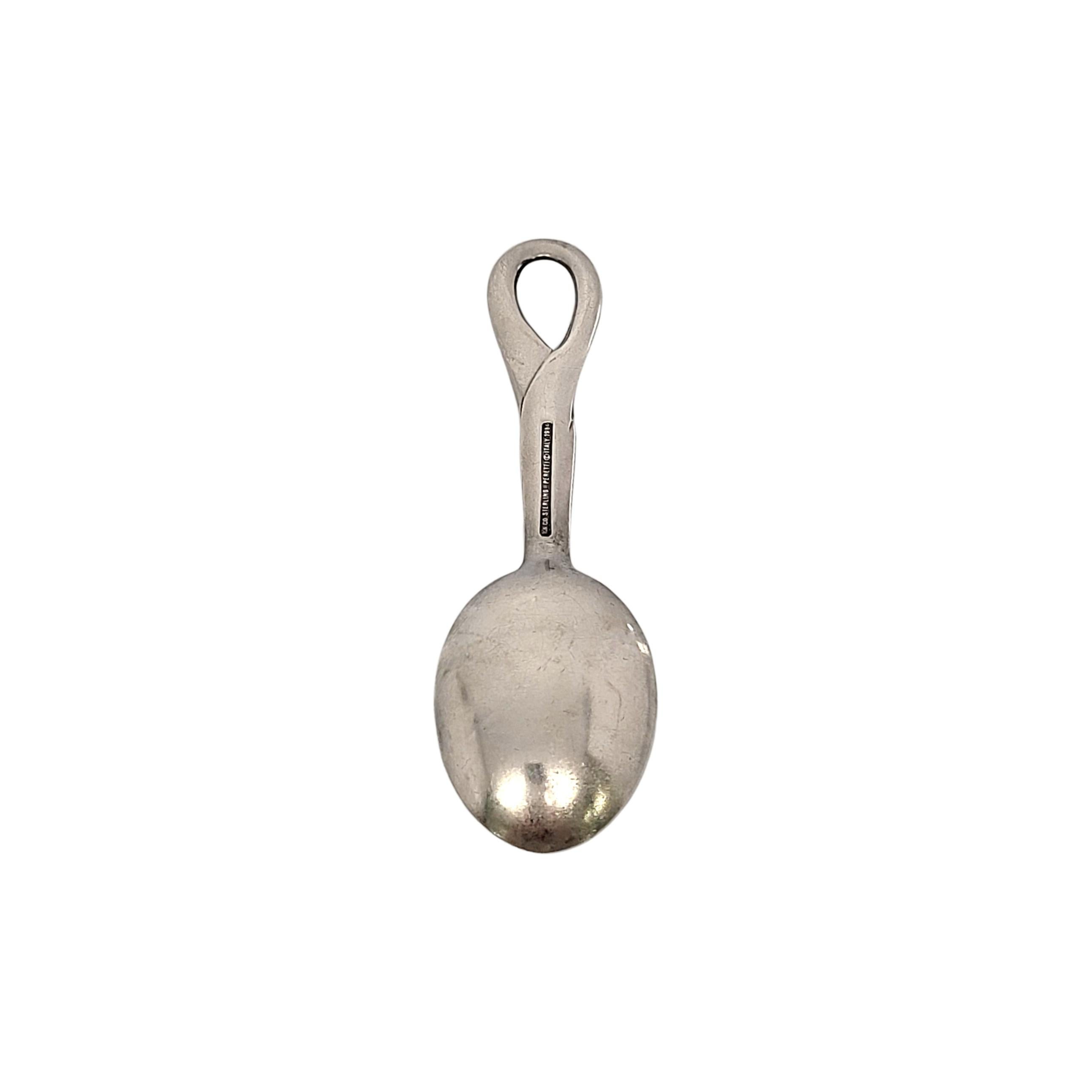 Tiffany & Co sterling silver child/baby feeding spoon in the Padova pattern by Elsa Peretti.

No monogram

Padova is a simple and classic design featuring a loop at the top of the handle, named for the Italian city in which it was created in. Does