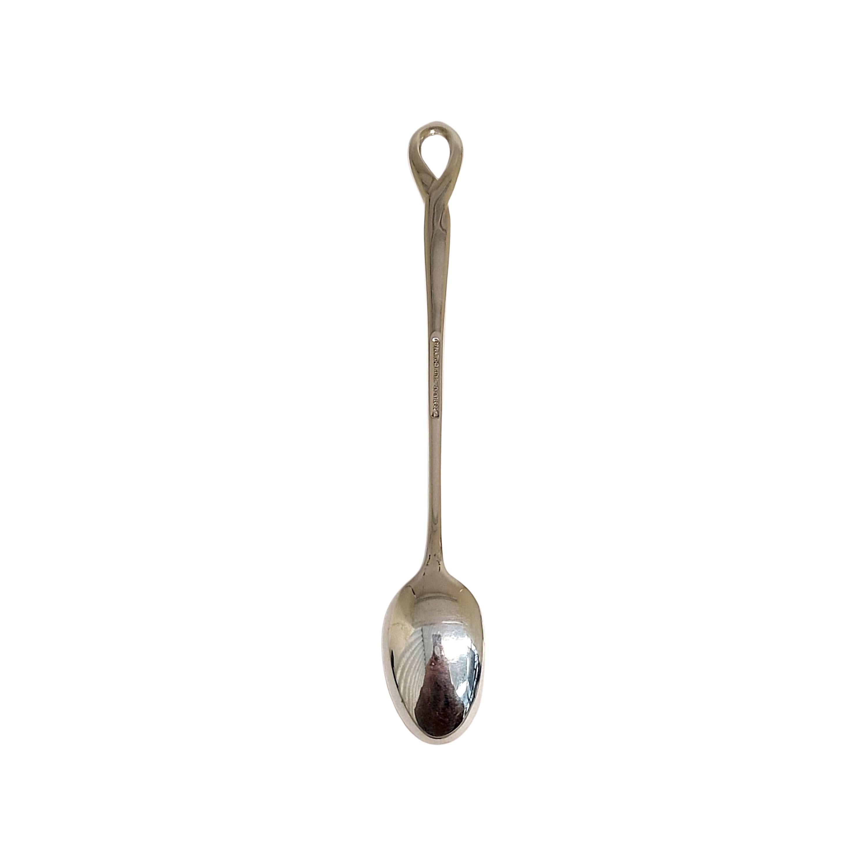 Tiffany & Co sterling silver baby feeding spoon in the Padova pattern by Elsa Peretti.

No monogram

Padova is a simple and classic design featuring a loop at the top of the handle, named for the Italian city in which it was created in. Does not
