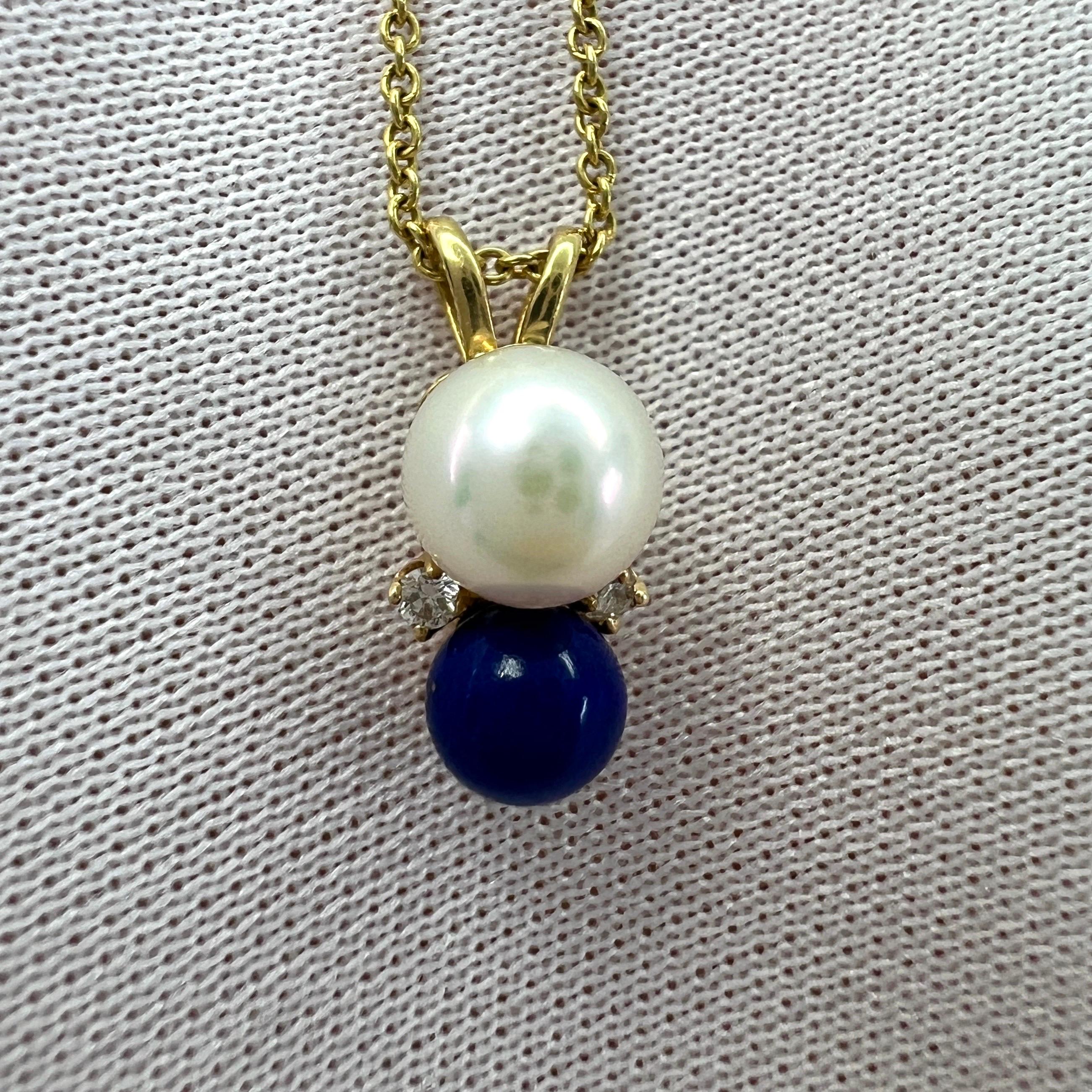 Vintage Tiffany & Co. Elsa Peretti White Pearl, Lapis Lazuli & Diamond 18k Yellow Gold Pendant Necklace.

Beautiful multi stone necklace from the renowned Elsa Peretti collection.
This pendant necklace features a 6.5mm white cultured pearl and a 5mm