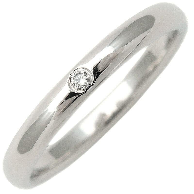 TIFFANY & Co. Anillo Elsa Peretti Platino .02 Diamante 8.5

 Metal: Platino
 Tamaño: 8.5 
 Ancho de banda: 2.8 mm
 Peso: 5.70 gramos 
 Diamante: Un diamante brillante redondo, peso total en quilates 0,02
 Sello: TIFFANY&CO. PERETTI PT950
 Estado: