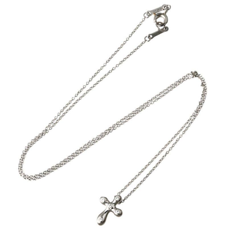 TIFFANY & Co. Elsa Peretti Platinum .05ct Diamond Cross Pendant Necklace  In Excellent Condition For Sale In Los Angeles, CA