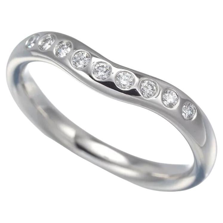 TIFFANY & Co. Anillo Elsa Peretti de platino con diamante de 0,10 ct y banda curva de 3 mm 5,5