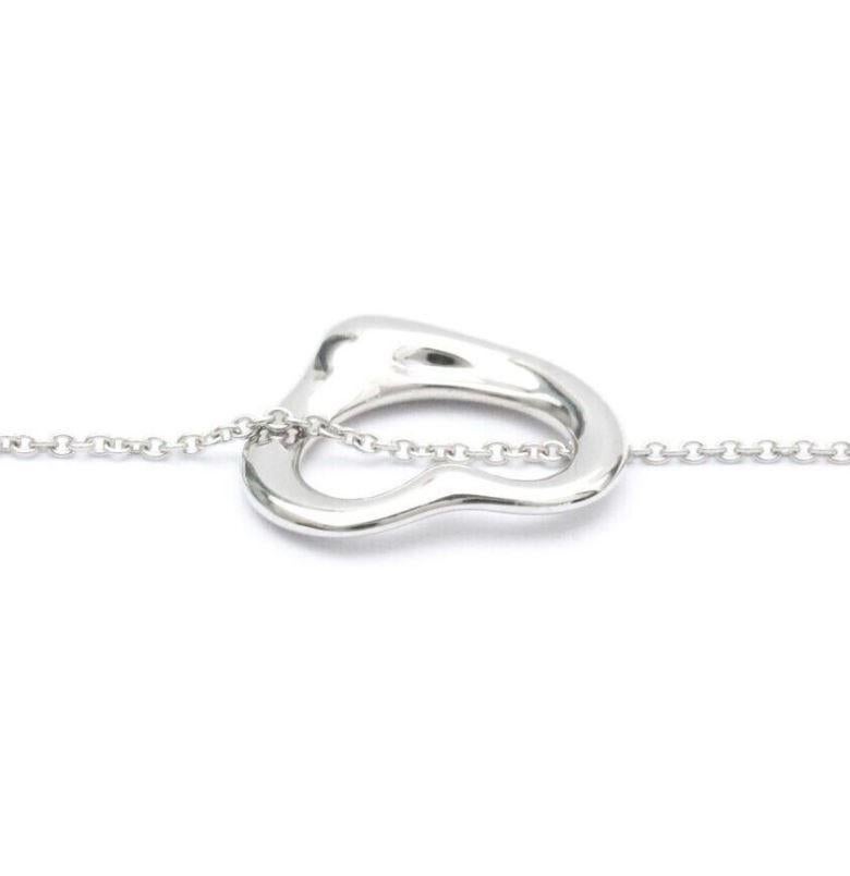 TIFFANY & Co. Elsa Peretti Platinum 16mm Open Heart Pendant Necklace In Excellent Condition For Sale In Los Angeles, CA