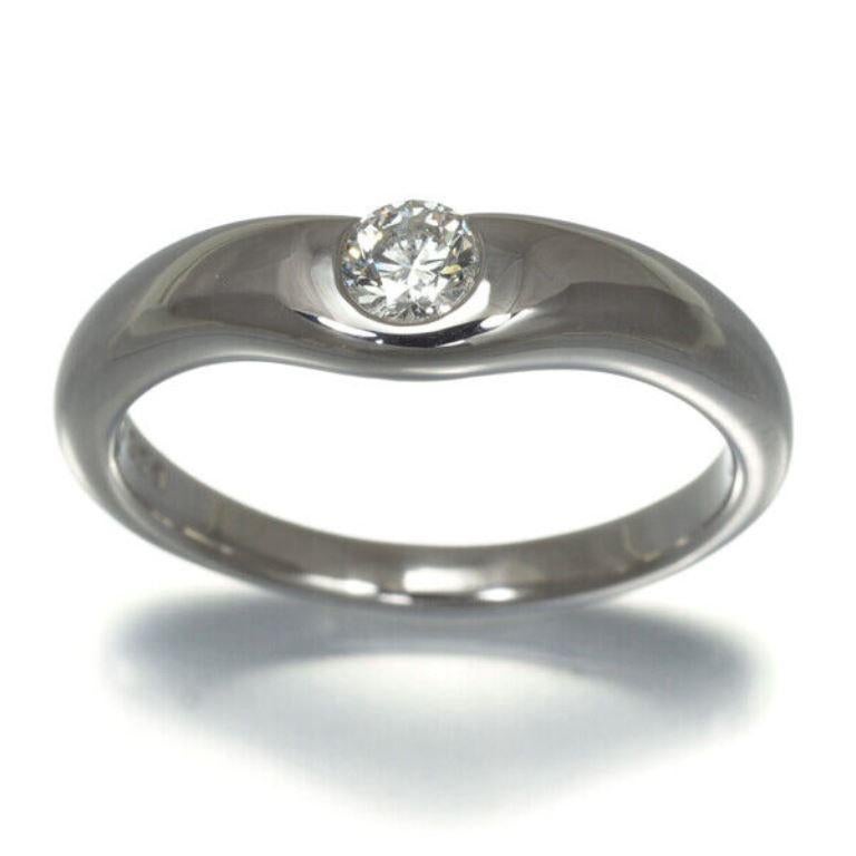 TIFFANY & Co. Elsa Peretti Platinum .18ct Diamond Curved Band Ring 5

Metal: Platinum
Size: 5
Weight: 5.80 grams
Diamond: round brilliant diamond, carat weight .18
Hallmark: 