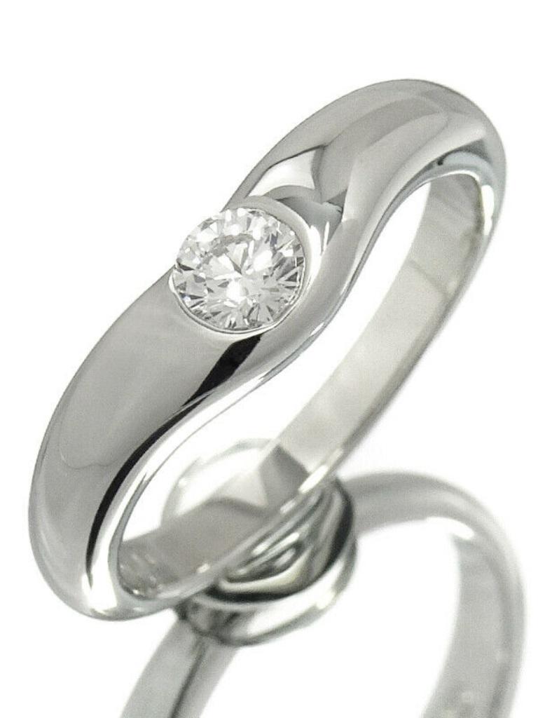 TIFFANY & Co. Elsa Peretti Platinum .18ct Diamond Curved Band Ring 7

Metal: Platinum
Size: 7
Weight: 6.50 grams
Diamond: round brilliant diamond, carat weight .18
Hallmark: 