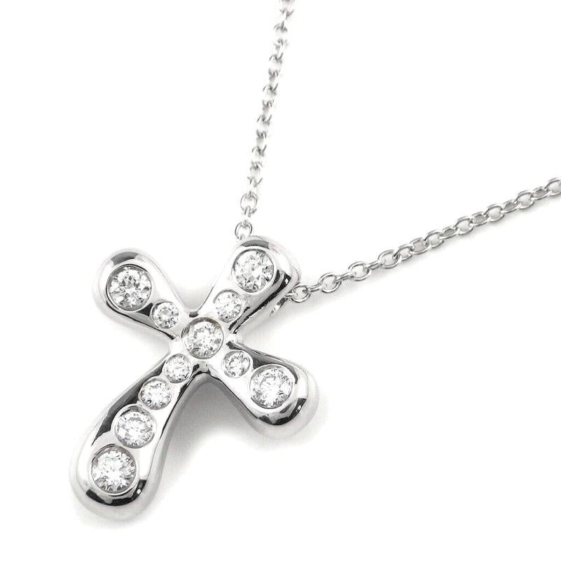 TIFFANY & Co. Elsa Peretti Platinum .20ct Diamond Cross Pendant Necklace 

Metal: Platinum
Weight: 7.30 grams 
Chain: 16