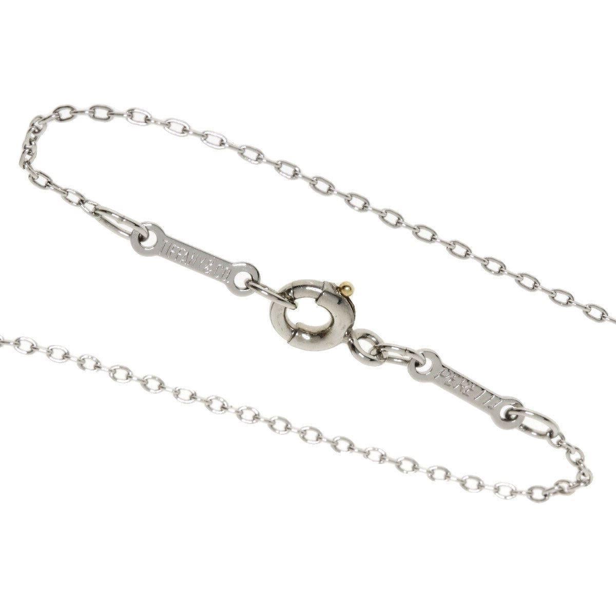 TIFFANY & Co. Elsa Peretti Platinum .20ct Diamond Cross Pendant Necklace For Sale 1