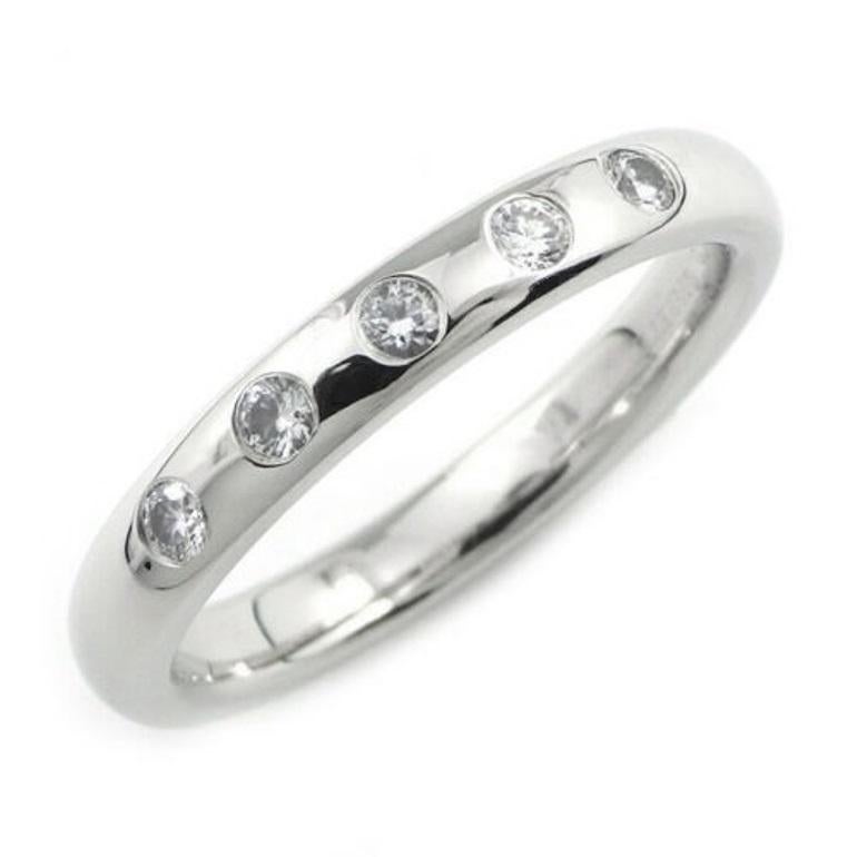 TIFFANY & Co. Elsa Peretti Platinum .10ct Diamond Stacking Band Ring 5

 Metal: Platinum
 Size: 5 
 Band Width: 2.7mm
 Weight: 5.30 grams 
 Diamond: 5 round brilliant diamonds, carat total weight .10 
 Hallmark: T&Co. ©PERETTI PT950 SPAIN 
