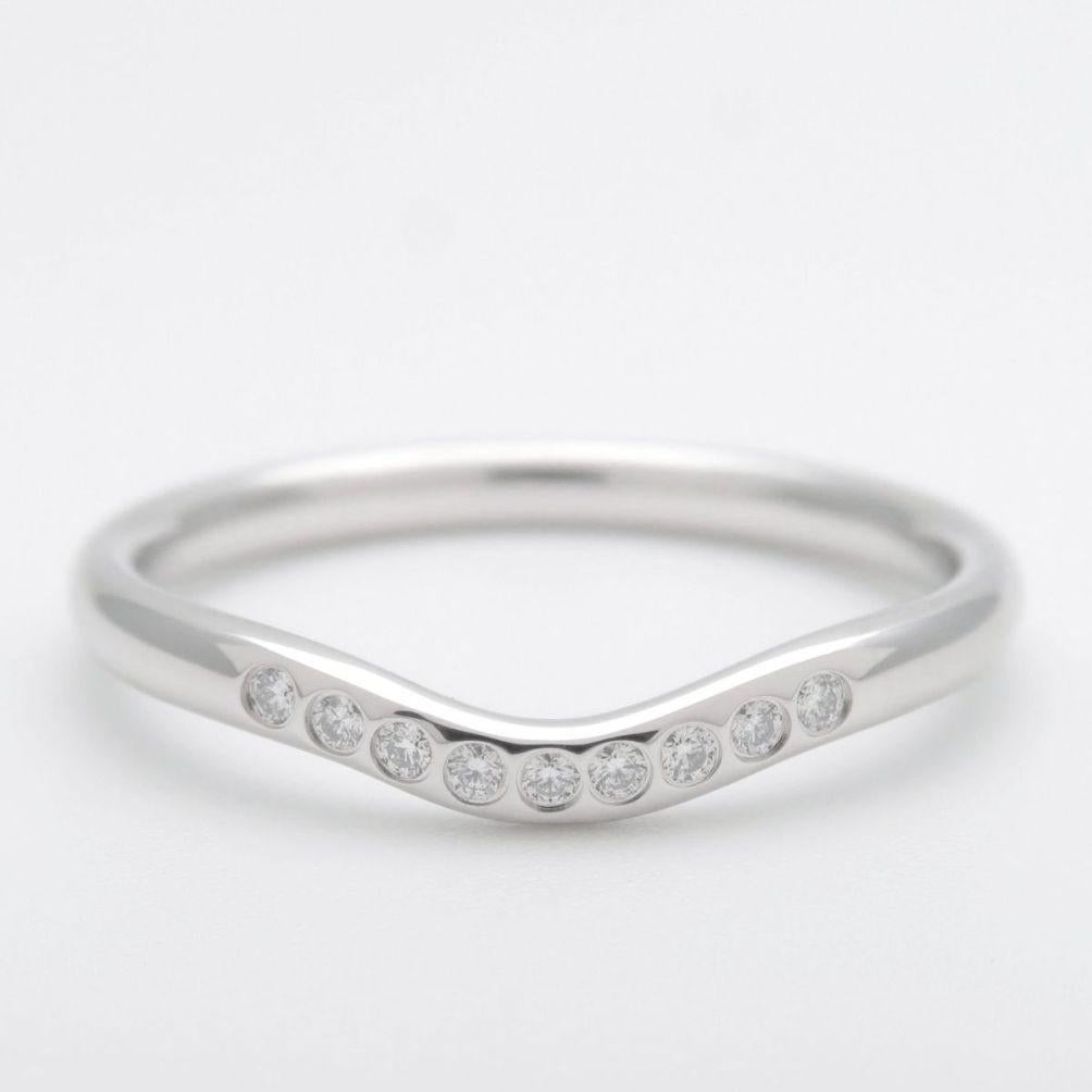 TIFFANY & Co. Elsa Peretti Anello nuziale curvo con diamante di platino da 2 mm 5

Metallo: Platino
Dimensione: 5
Peso: 3.70 grammi
Larghezza della banda: 2 mm
Diamante: 9 diamanti tondi brillanti, peso totale .06 carati 
Marchio: ©PERETTI SPAIN