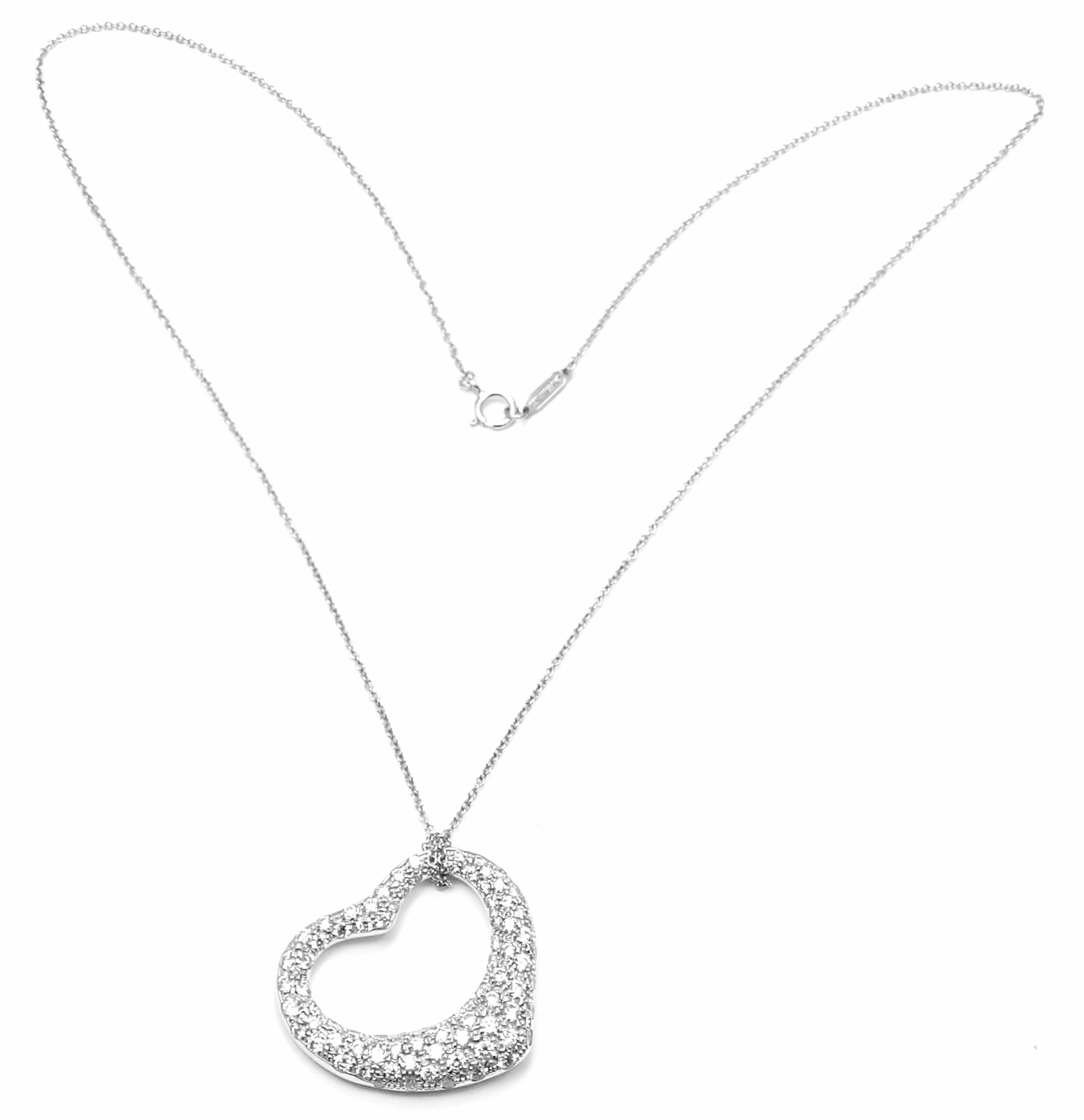 Platinum Diamond Open Heart Pendant Necklace by Elsa Peretti for Tiffany & Co.
With Diamonds VS1 clarity, G color total weight approx. 3.00ct
Details:
Length: 16.5