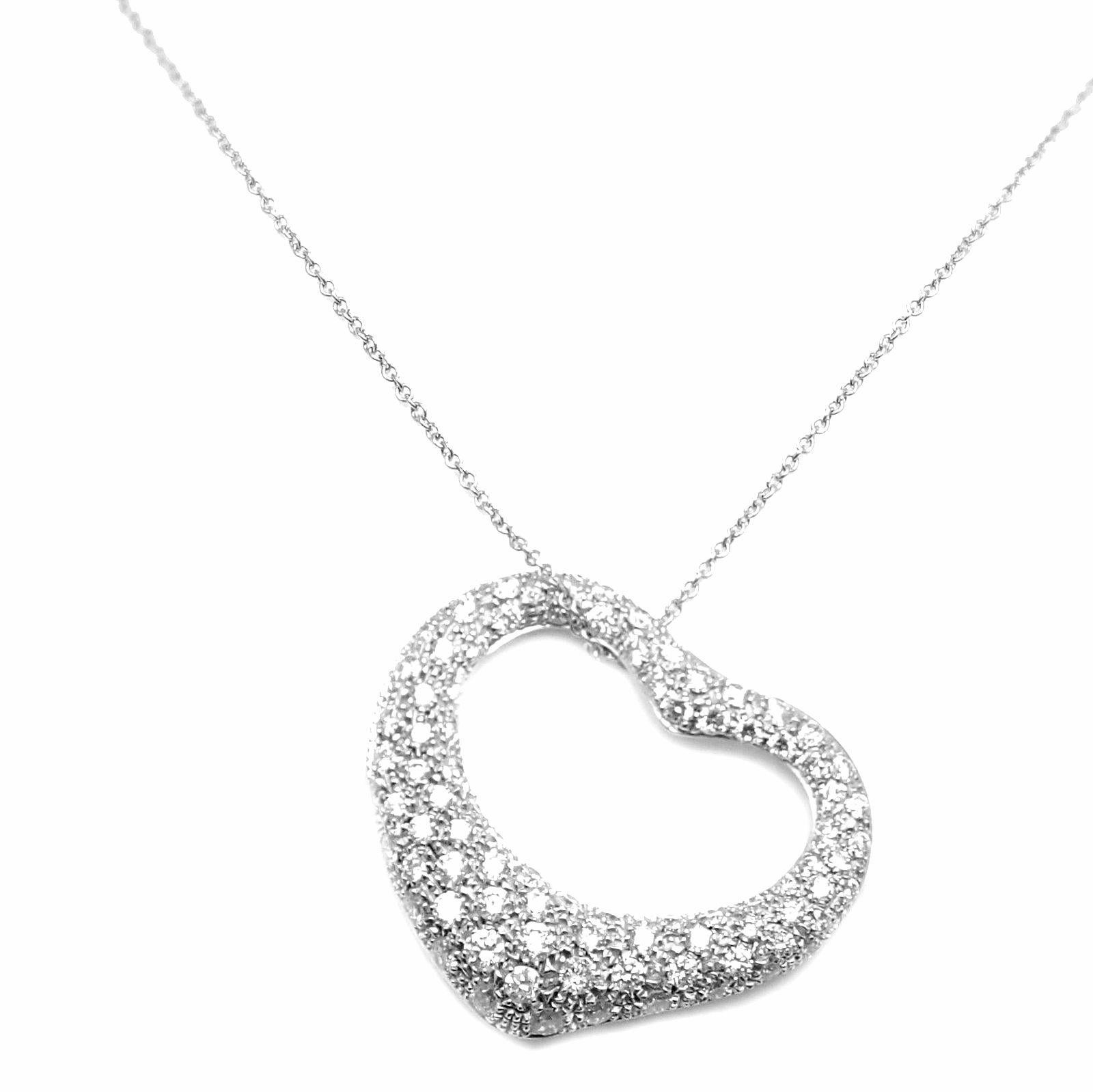 Platinum Diamond Open Heart Pendant Necklace by Elsa Peretti for Tiffany & Co.
With Diamonds VS1 clarity, G color total weight approx. 2.00ct
Details:
Length: 16.5