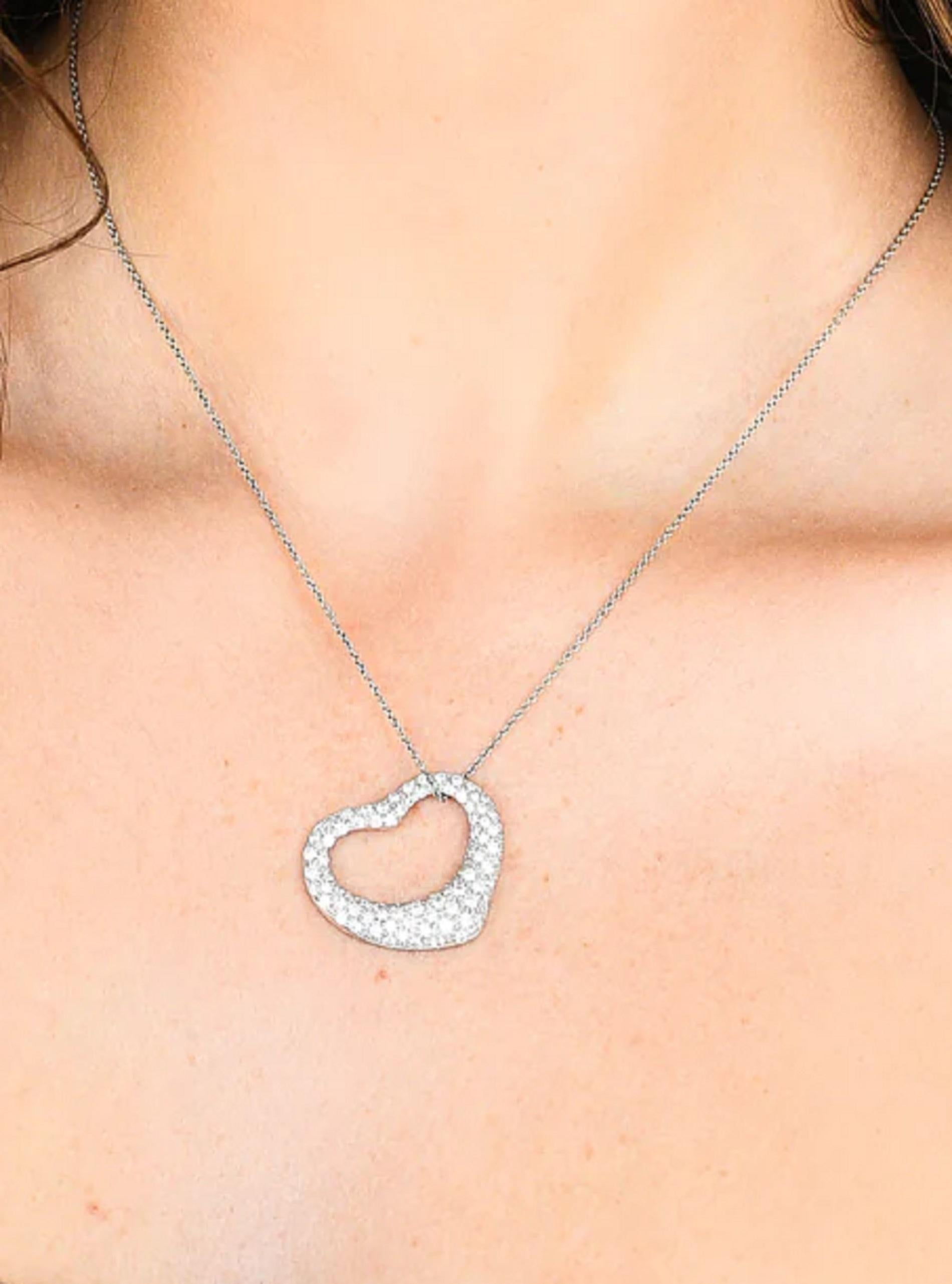 Tiffany & Co. Elsa Peretti Platinum Pavé Diamond Heart Pendant Necklace

This stunning necklace is part of the iconic Elsa Peretti collection for Tiffany & Co. The piece features a platinum pavé diamond heart pendant suspended from a brand new