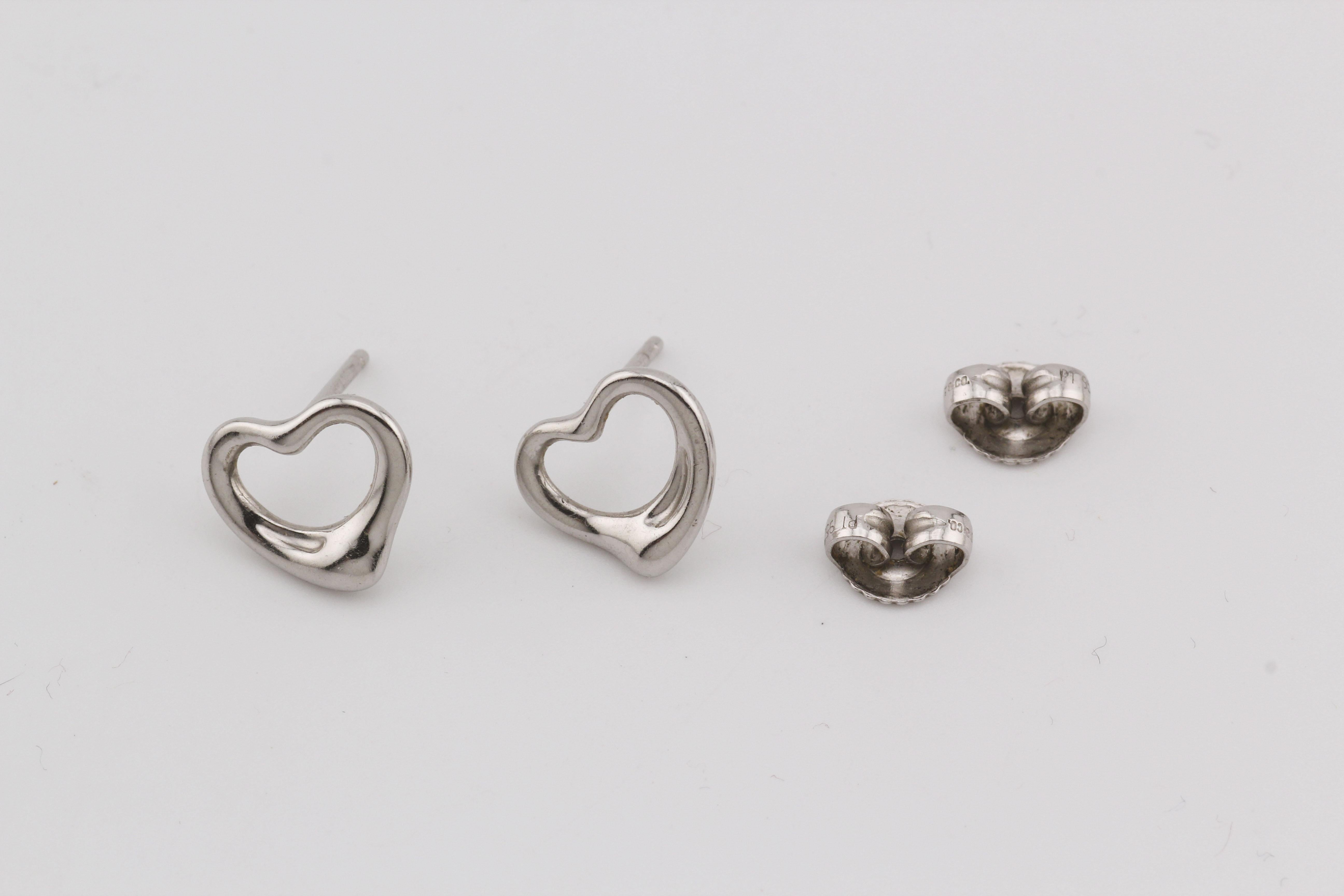 The Tiffany & Co. Platinum Heart Stud Earrings are a refined expression of elegance and simplicity. Crafted from lustrous platinum, these earrings feature an open heart design that captures a sense of timeless charm.

The smooth, flowing lines of