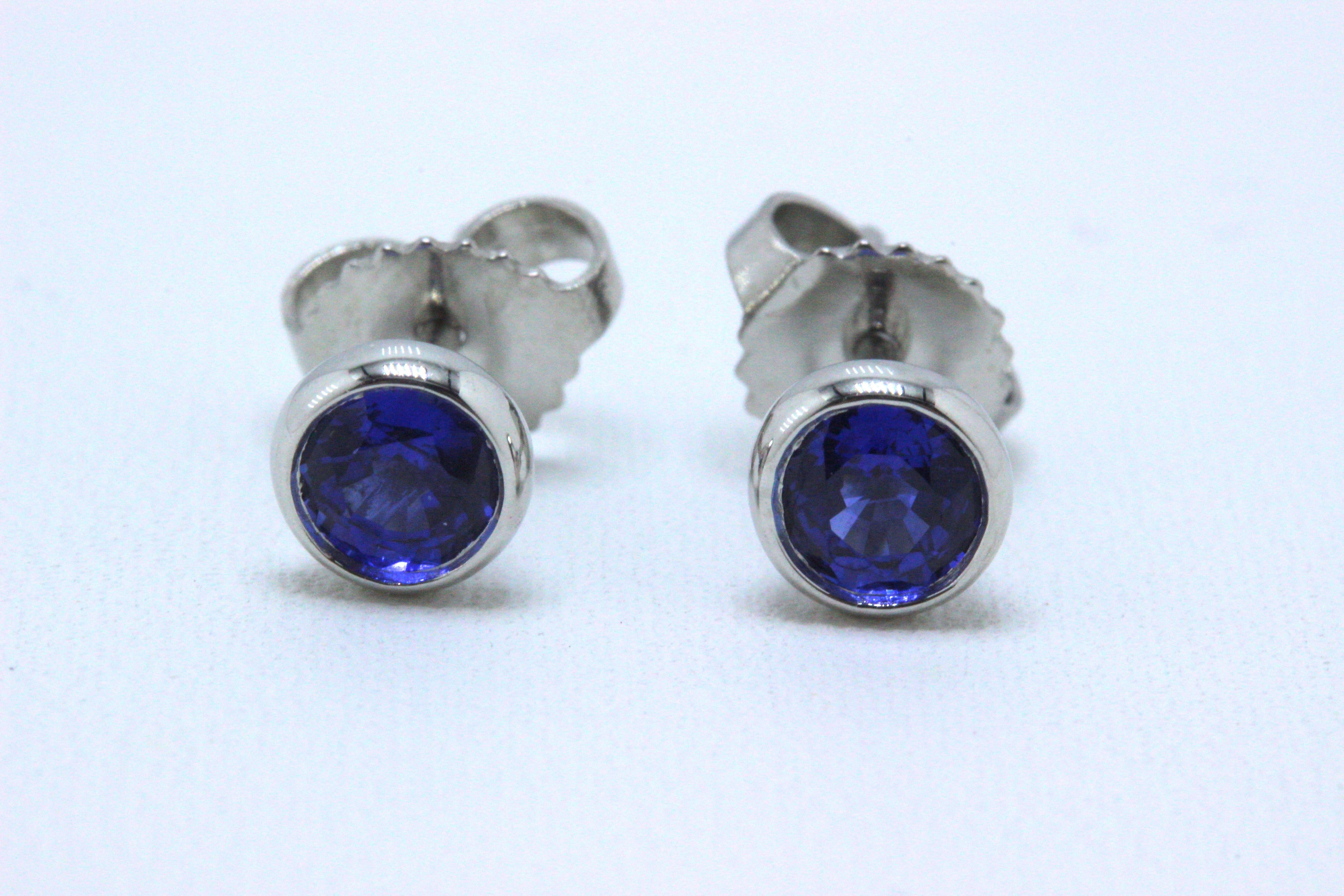 Tiffany & Co.
Style:  Elsa Peretti Sapphire Color by the Yard
Metal:  Platinum PT950
Width:  5 mm
Total Carat Weight:  0.70 TCW
Sapphire Shape:  Round
Color:  Blue
Hallmark:  ©ELSAPERETTIT&CO.PT950 on earrings & ©T&CO.PT950 on backs
Includes:  T&C