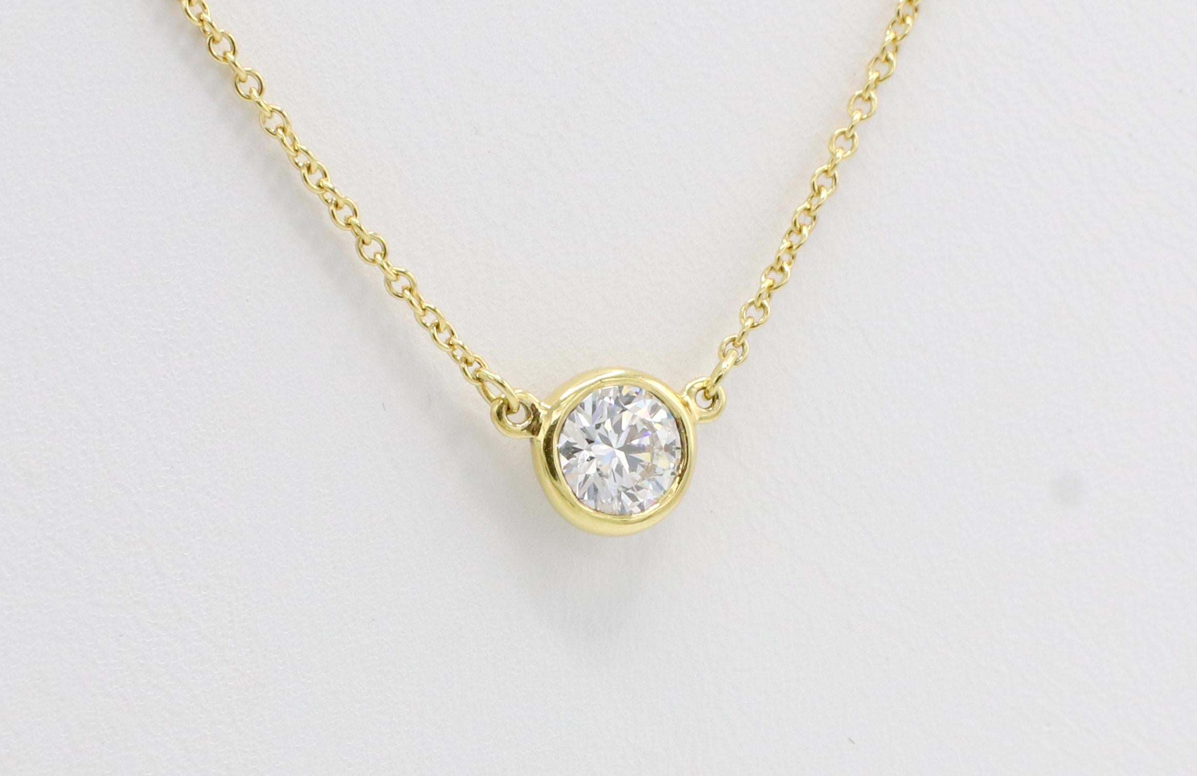 Tiffany & Co. Elsa Peretti Single Diamond By The Yard Pendant Yellow Gold Necklace
Metal: 18k yellow gold
Weight: 1.86 grams
Diamond: Approx. .54 CT G VS
Chain: 17 inches
