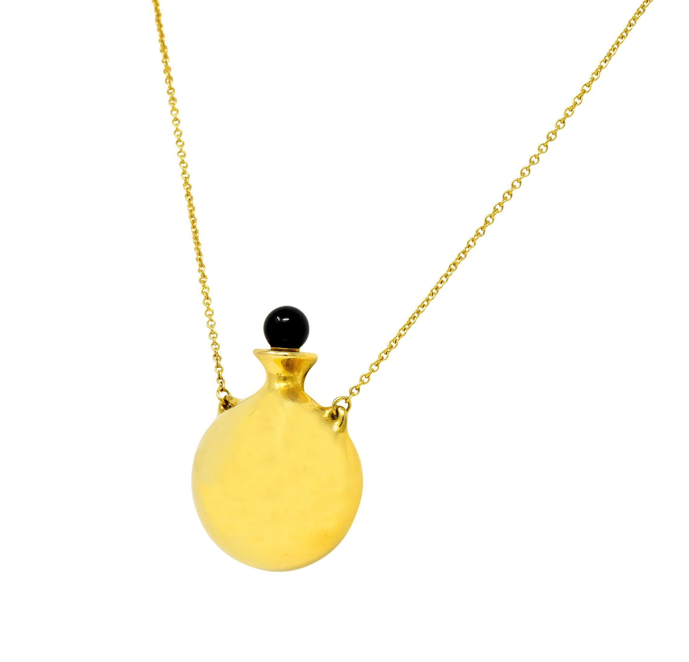 Featuring a realistic stylized rounded bottle pendant in high polished 18k gold with round black jade orb on stopper

Stopper has 'wand' for applying perfume

Completed with cable chain and spring ring clasp

Fully signed Tiffany & Co., Elsa