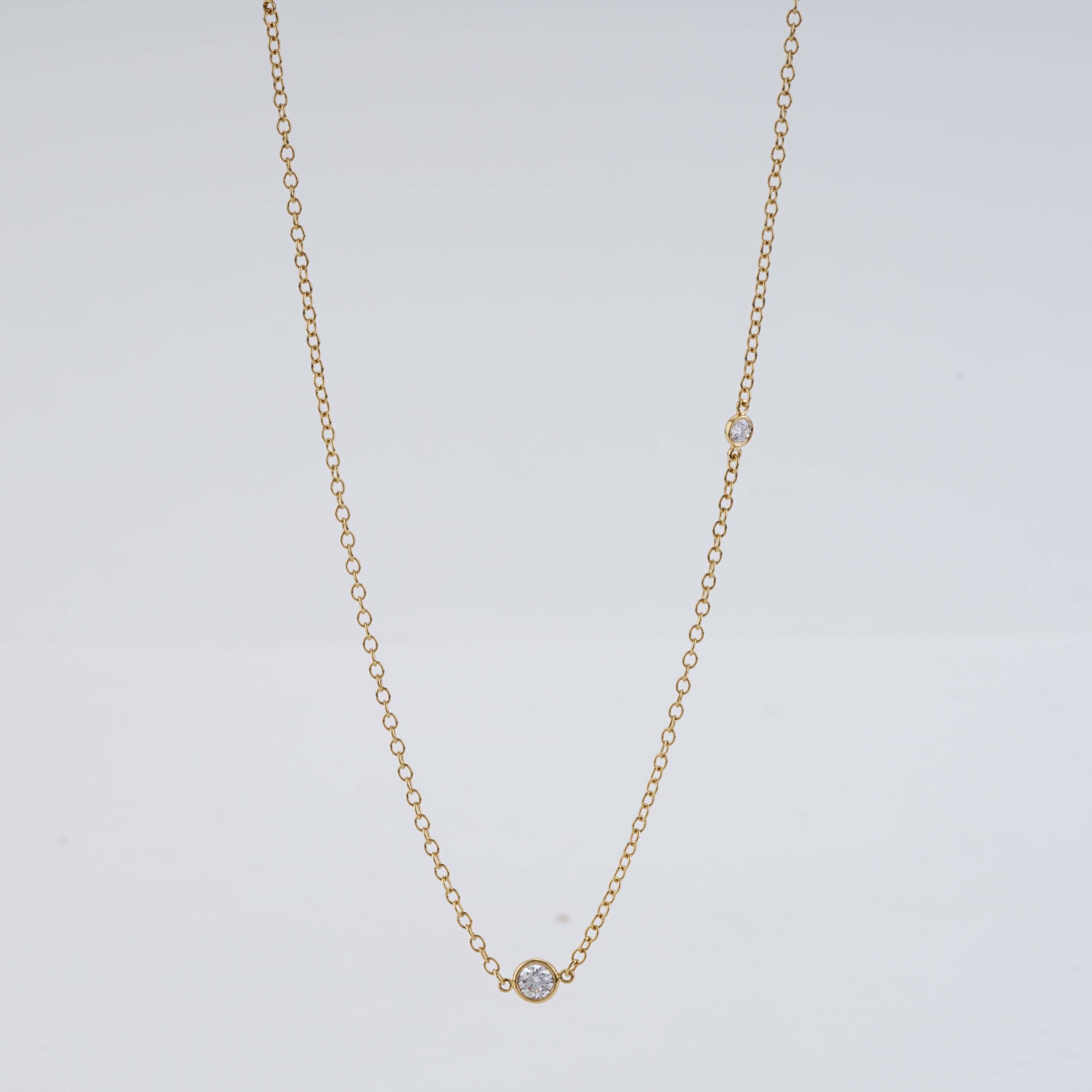 This Tiffany & Co. Elsa Peretti Sprinkle Collection Necklace is 36 inches in length and weighs 3.90 DWT (approx. 6.07 grams). It contains 12 round G and VS clarity diamonds weighing a total of 1.21 carats. Style # 43605878