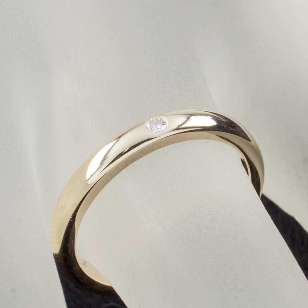 Gorgeous Stacking Ring by Elsa Peretti!
18k Yellow Gold
Features a Flush Set Diamond Solitaire
Approximately 2 mm Wide
Size 5.25
Total Mass = 3.5 grams
Retails for $850
A Great Deal!