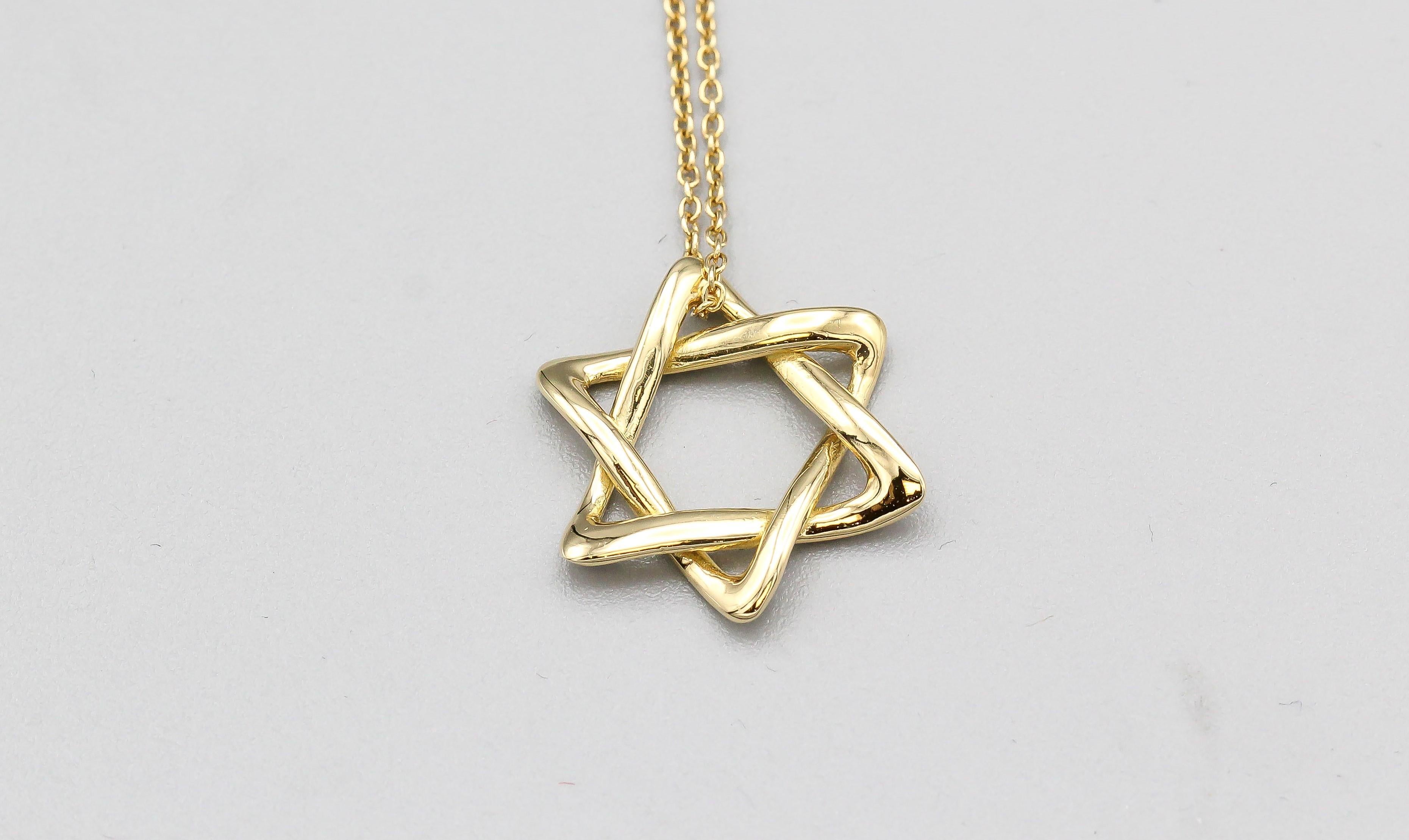 Introducing the Tiffany & Co. Elsa Peretti Star of David 18k Yellow Gold Large Pendant Necklace, a graceful and meaningful piece of jewelry that combines spiritual significance with timeless elegance. Crafted by the iconic Tiffany & Co. and designed
