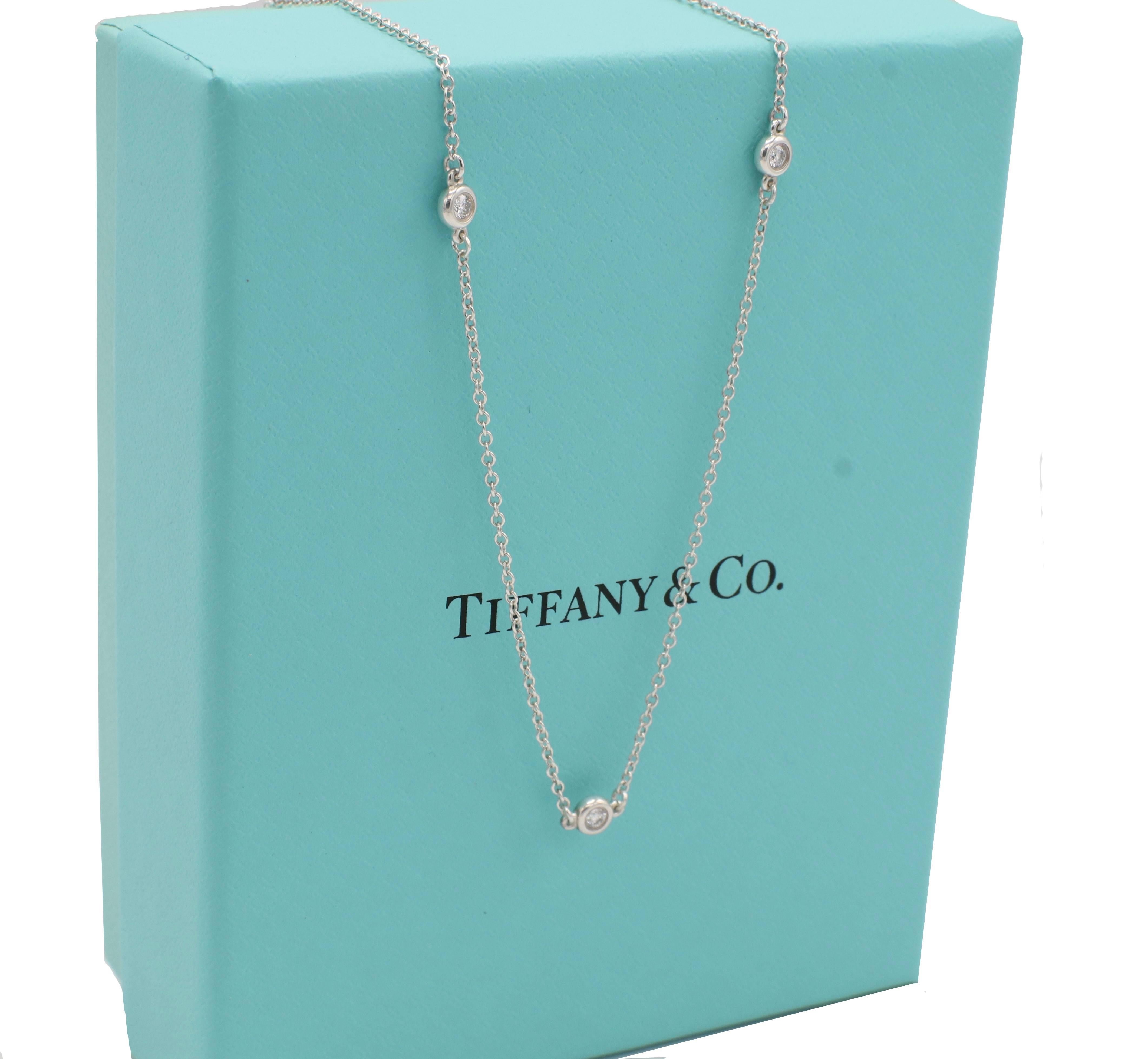 Tiffany & Co. Elsa Peretti Sterling Silver Natural Diamond By The Yard Necklace 
Metal: Sterling silver 925
Weight: 1.63 grams
Diamonds: 0.09 CTW F-G VS round natural diamonds
Length: 16 inches
Signed: Tiffany & Co. 925 ©PERETTI SPAIN
Retail: $1,275