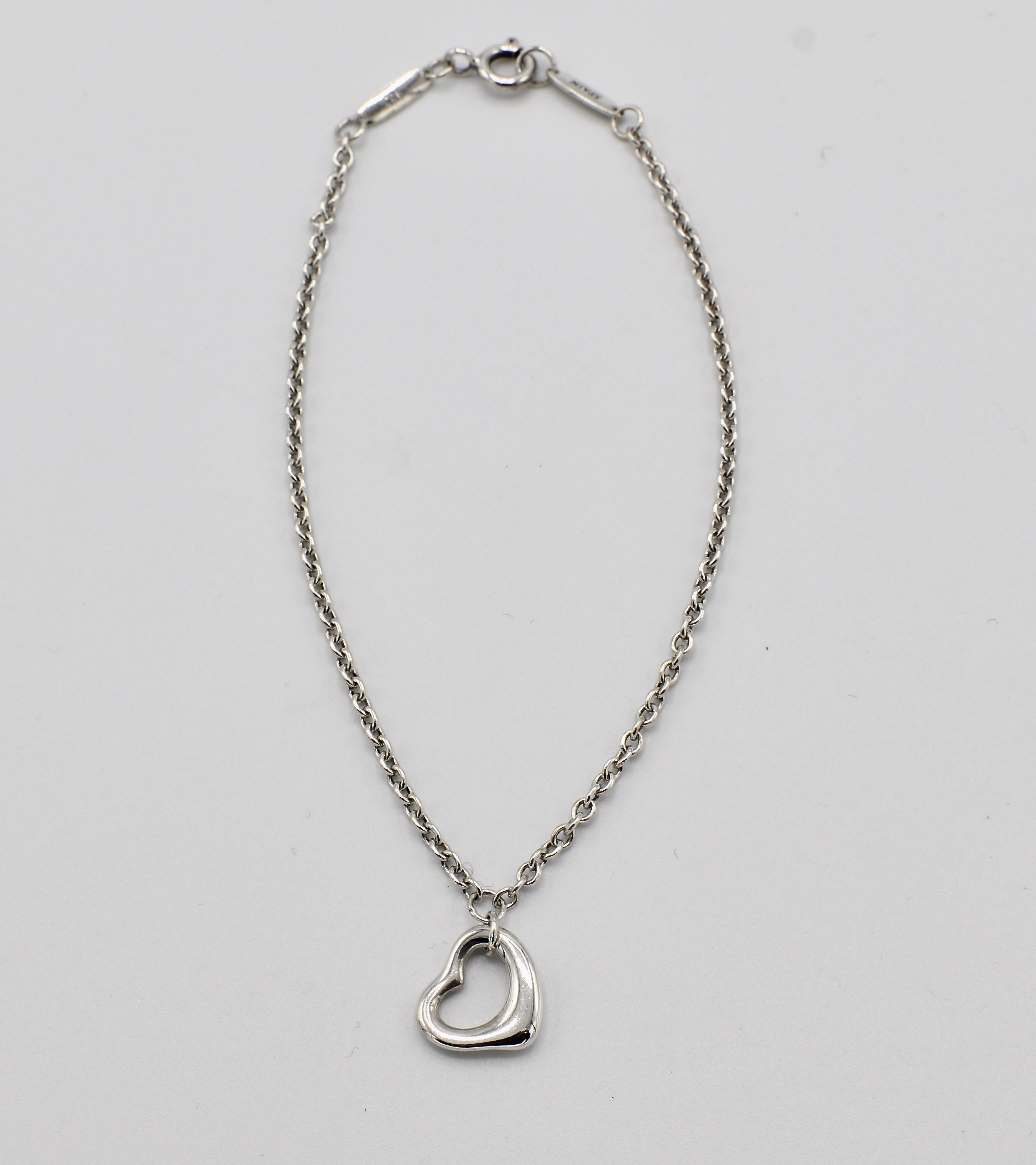 Tiffany & Co. Elsa Peretti Sterling Silver Open Heart Bracelet 7.5 Inches 
Metal: Sterling silver 925
Weight: 2.48 grams
Length: 7.5 inches 
Charm is approx. 11 x 9mm 
Signed: Tiffany & Co. PERETTI SPAIN 925