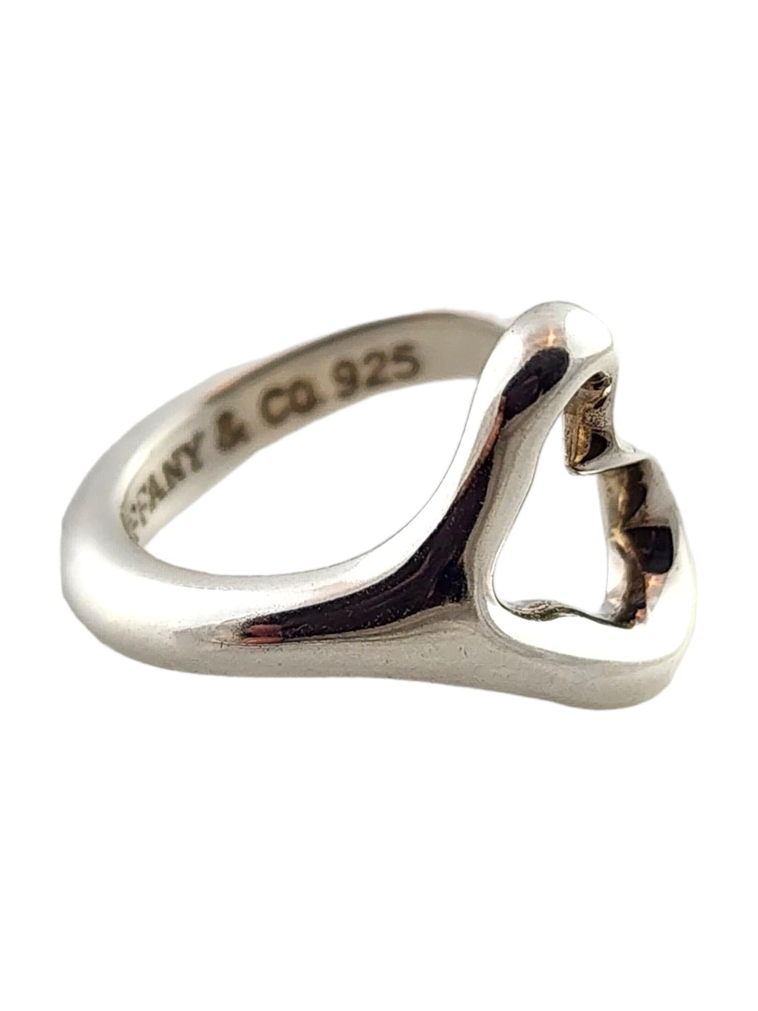 Tiffany & Co Elsa Peretti Sterling Silver Open Heart Ring Size 5

This beautiful Elsa Peretti open heart ring by designer Tiffany & Co was meticulously crafted from sterling silver for a beautiful finish!

Ring size: 5
Shank:3.75mm
Front: 15.7mm X