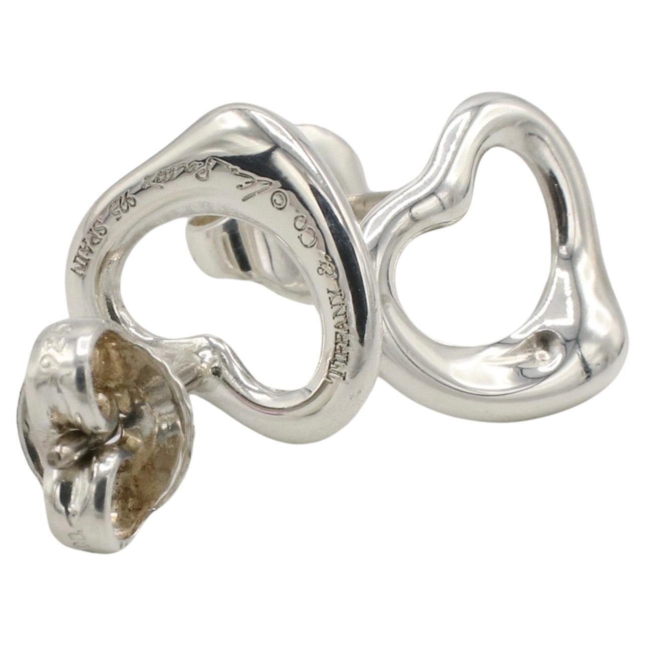 Tiffany & Co. Elsa Peretti Sterling Silver Open Heart Stud Earrings 
Metal: Sterling silver
Weight: 1.09 grams
Dimensions: 10 x 11mm 
Signed: Tiffany & Co. © Elsa Peretti 925 SPAIN 
Retail: $410