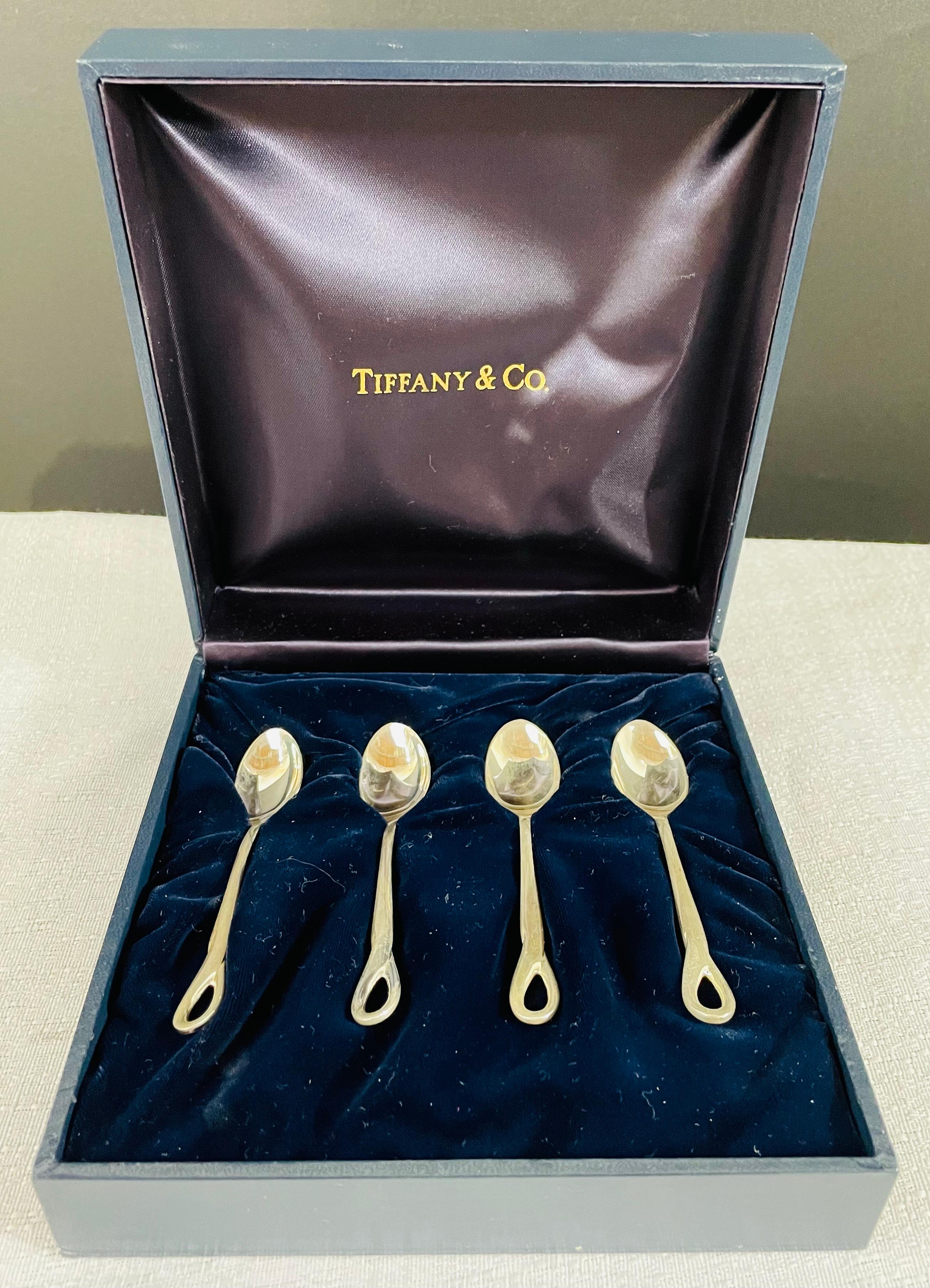 A set of 4 Tiffany & Co Elsa Peretti sterling silver babe spoons presented in a dark blue original Tiffany box. each spoon is signed T& Co Sterling Peretti @Italy 1984. A high value collective items for the fans of the model and jewelry designer