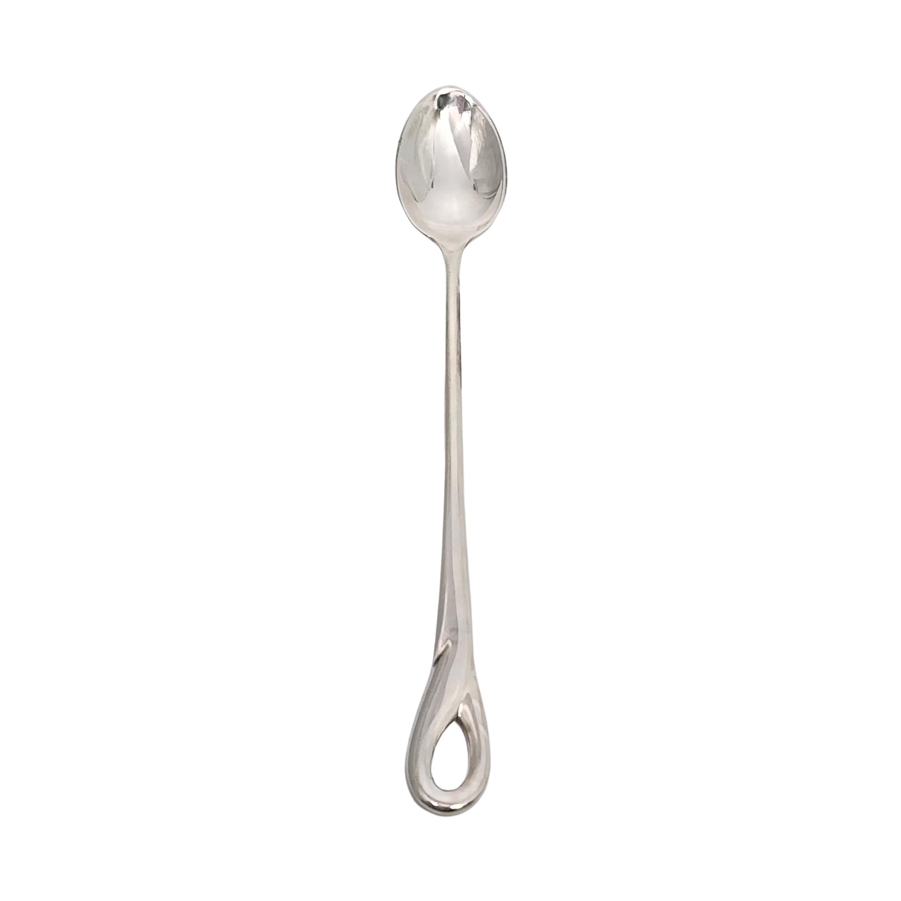 Tiffany & Co sterling silver baby feeding spoon in the Padova pattern by Elsa Peretti.

Padova is a simple and classic design featuring a loop at the top of the handle, named for the Italian city in which it was created. Includes Tiffany & Co box