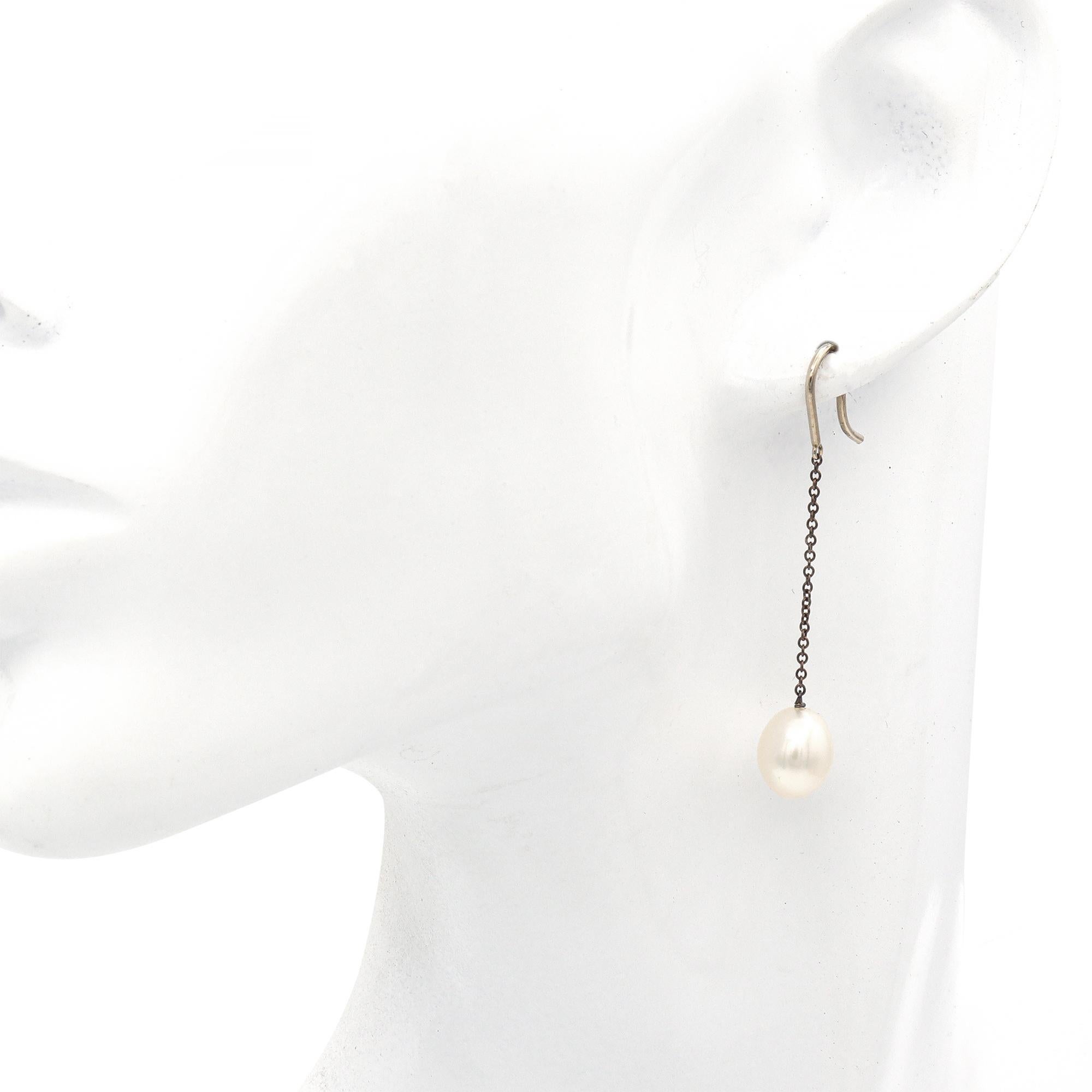 Exuding timeless elegance and minimalist charm, these Elsa Peretti for Tiffany & Co. Pearls by the Yard earrings are the epitome of understated luxury. Designed with Peretti’s signature organic style, each earring features a luminous cultured pearl